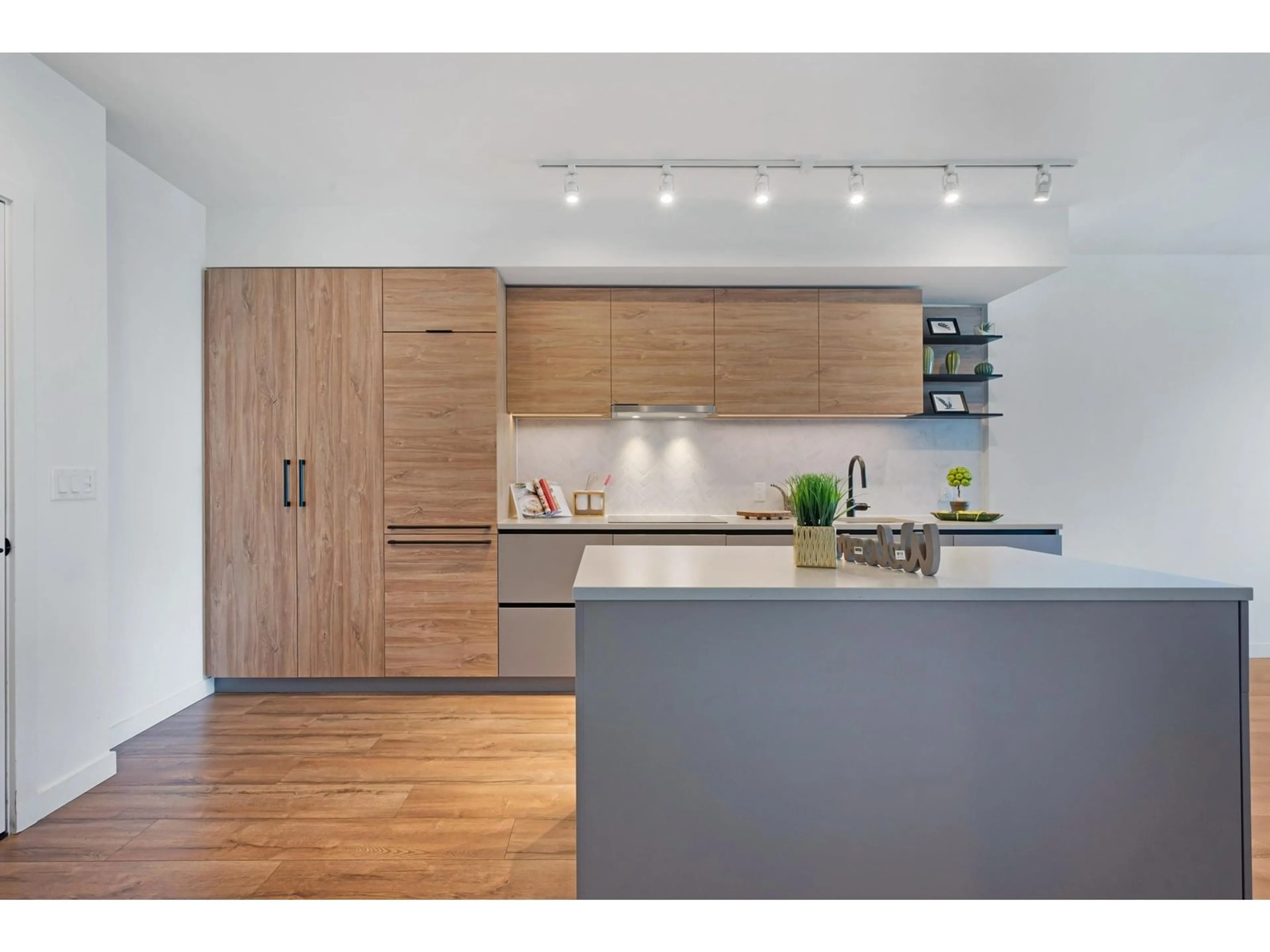 Contemporary kitchen, wood/laminate floor for 1307 - 13428 105, Surrey British Columbia V3T0S6