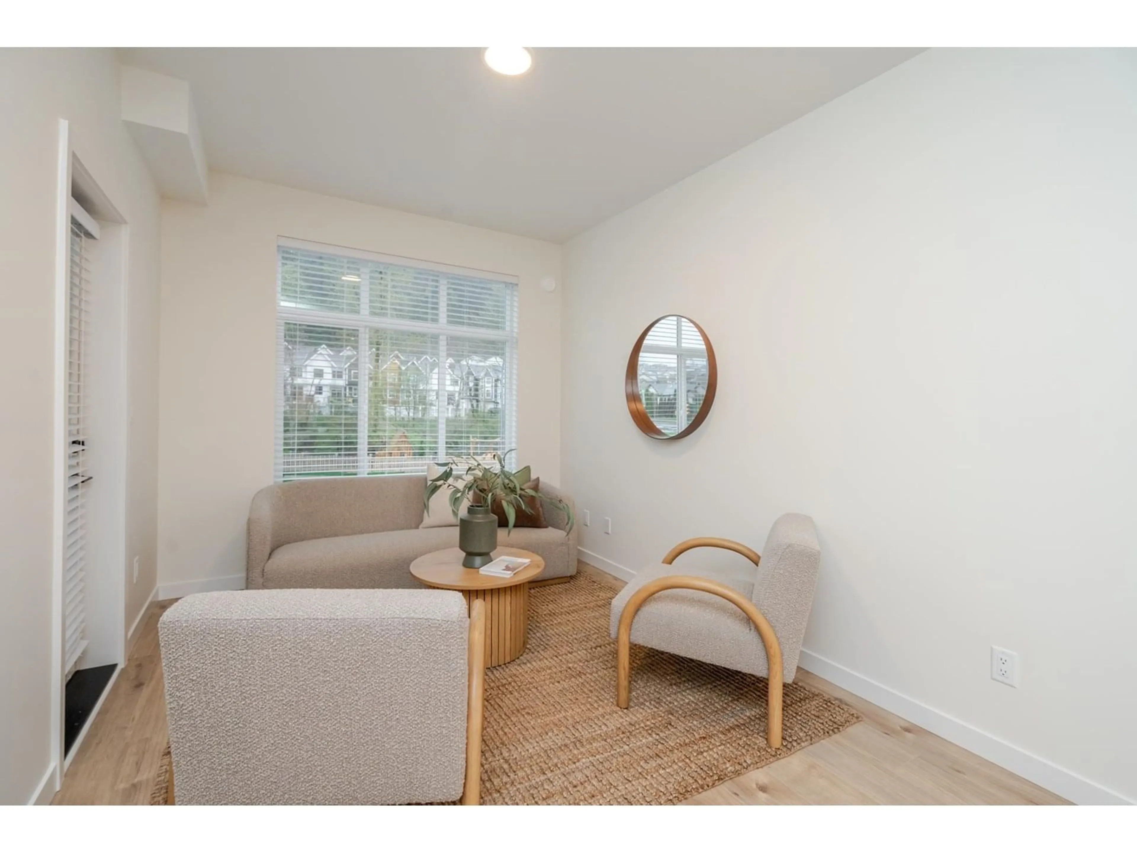 Living room with furniture, wood/laminate floor for 302 - 33920 BEST, Mission British Columbia V2V7A4