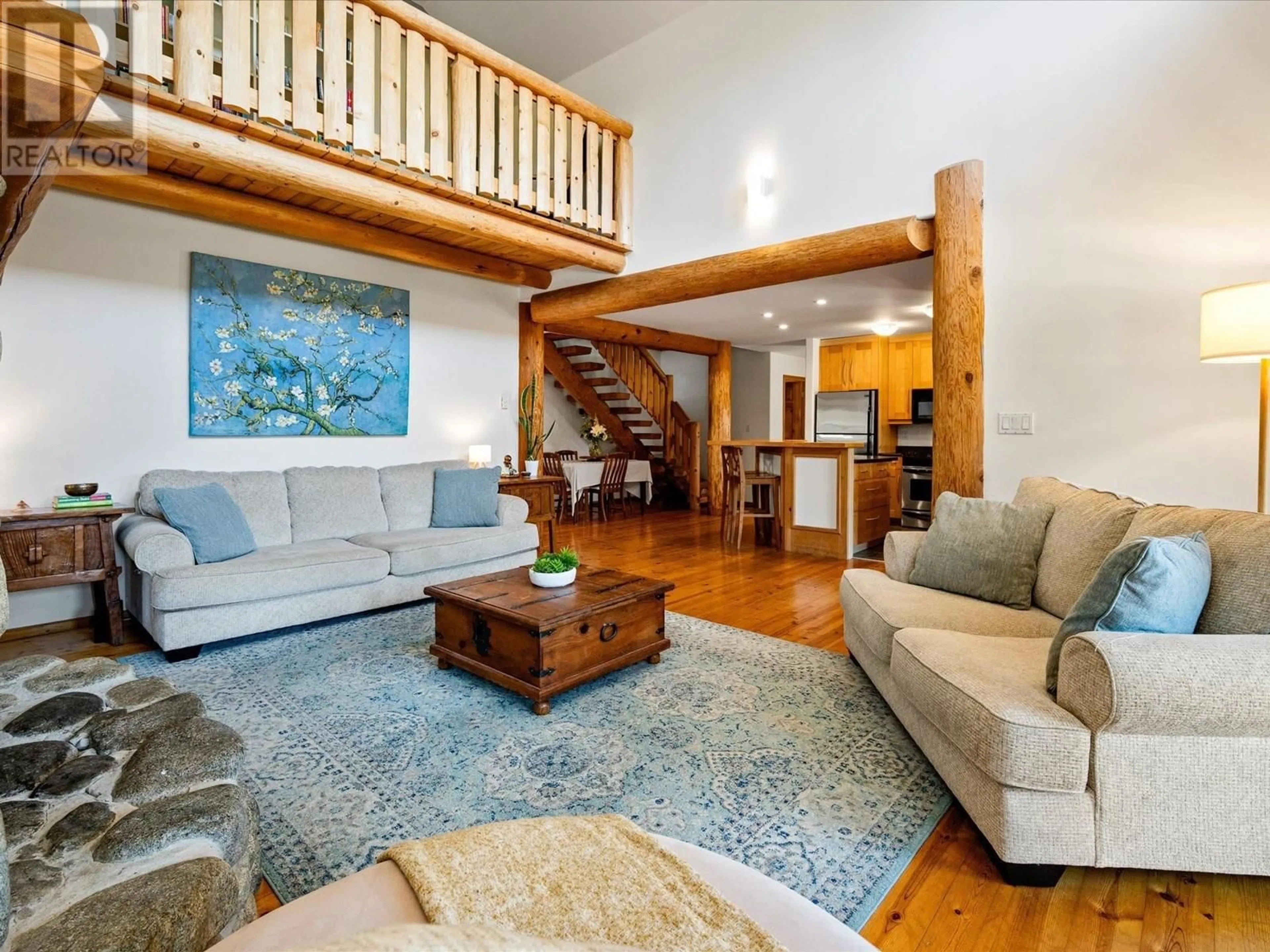 Living room with furniture, wood/laminate floor for 1474 HEMLOCK STREET, Pemberton British Columbia V0N2L1