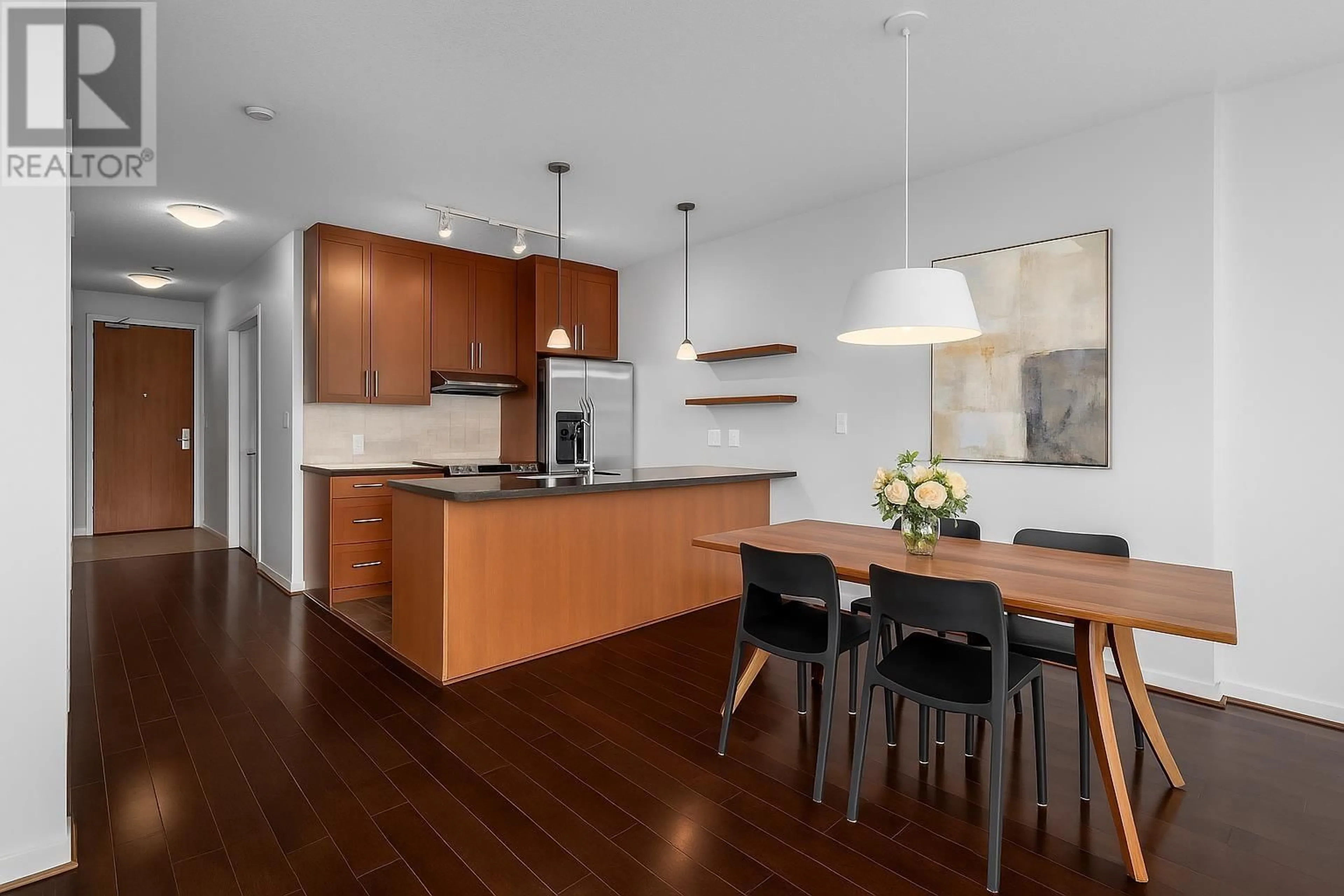 Open concept kitchen, wood/laminate floor for 2206 - 1189 MELVILLE STREET, Vancouver British Columbia V6E4T8