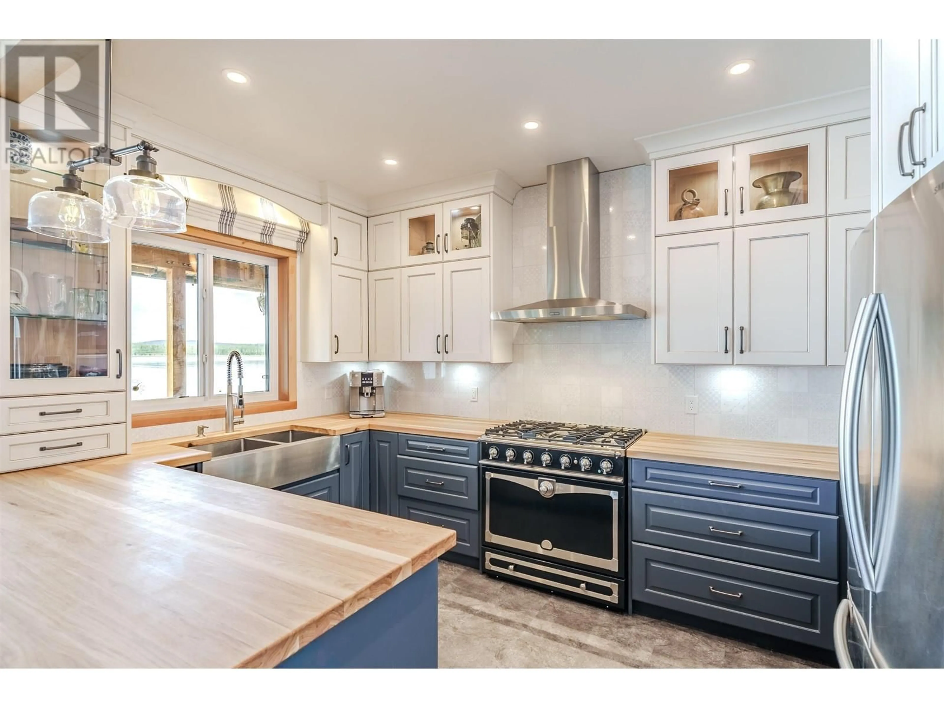Open concept kitchen, ceramic/tile floor for 1211 GREEN LAKE S ROAD, 100 Mile House British Columbia V0K2K2
