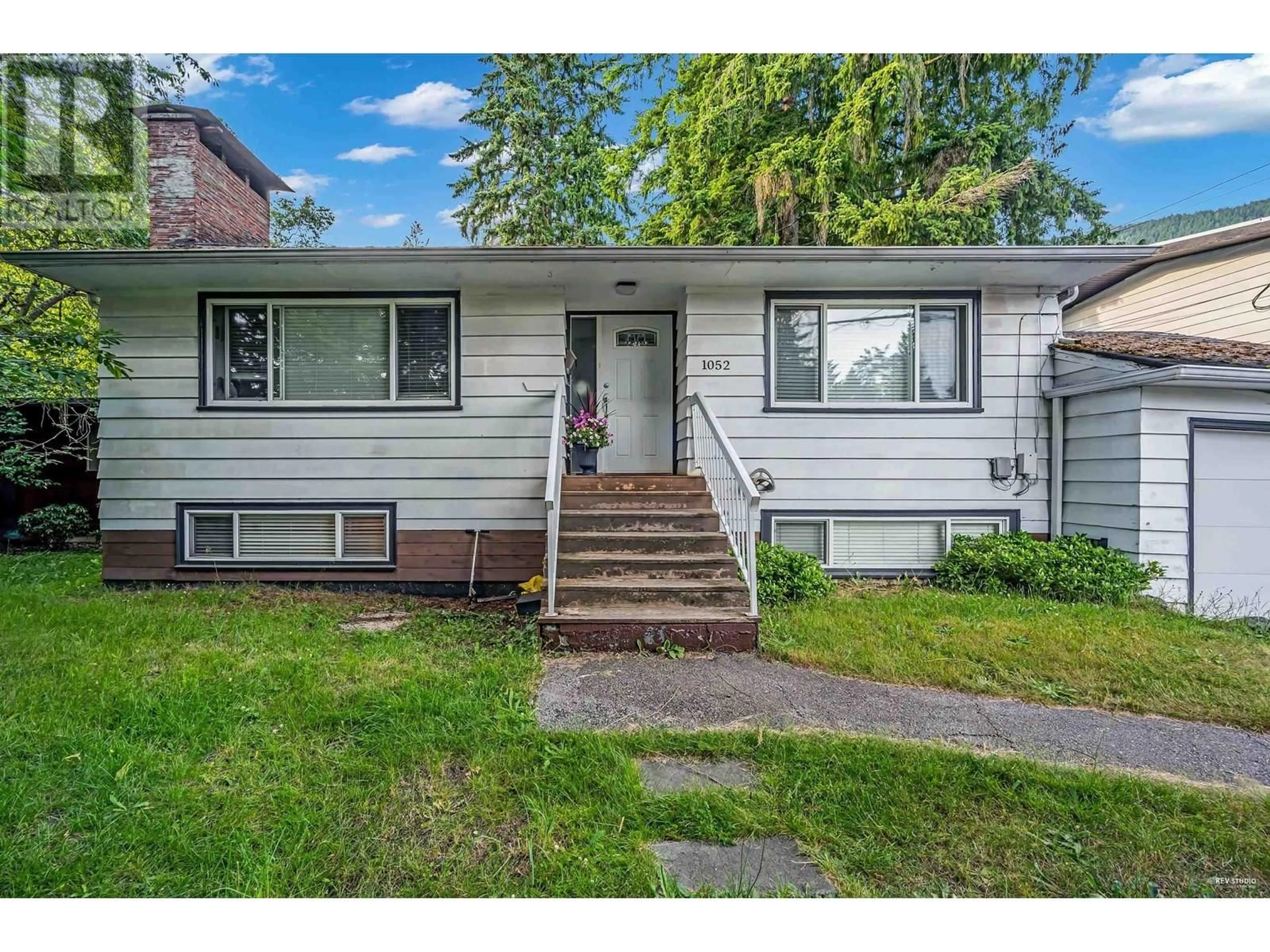 Home with vinyl exterior material, street for 1052 MONTROYAL BOULEVARD, North Vancouver British Columbia V7R2H4