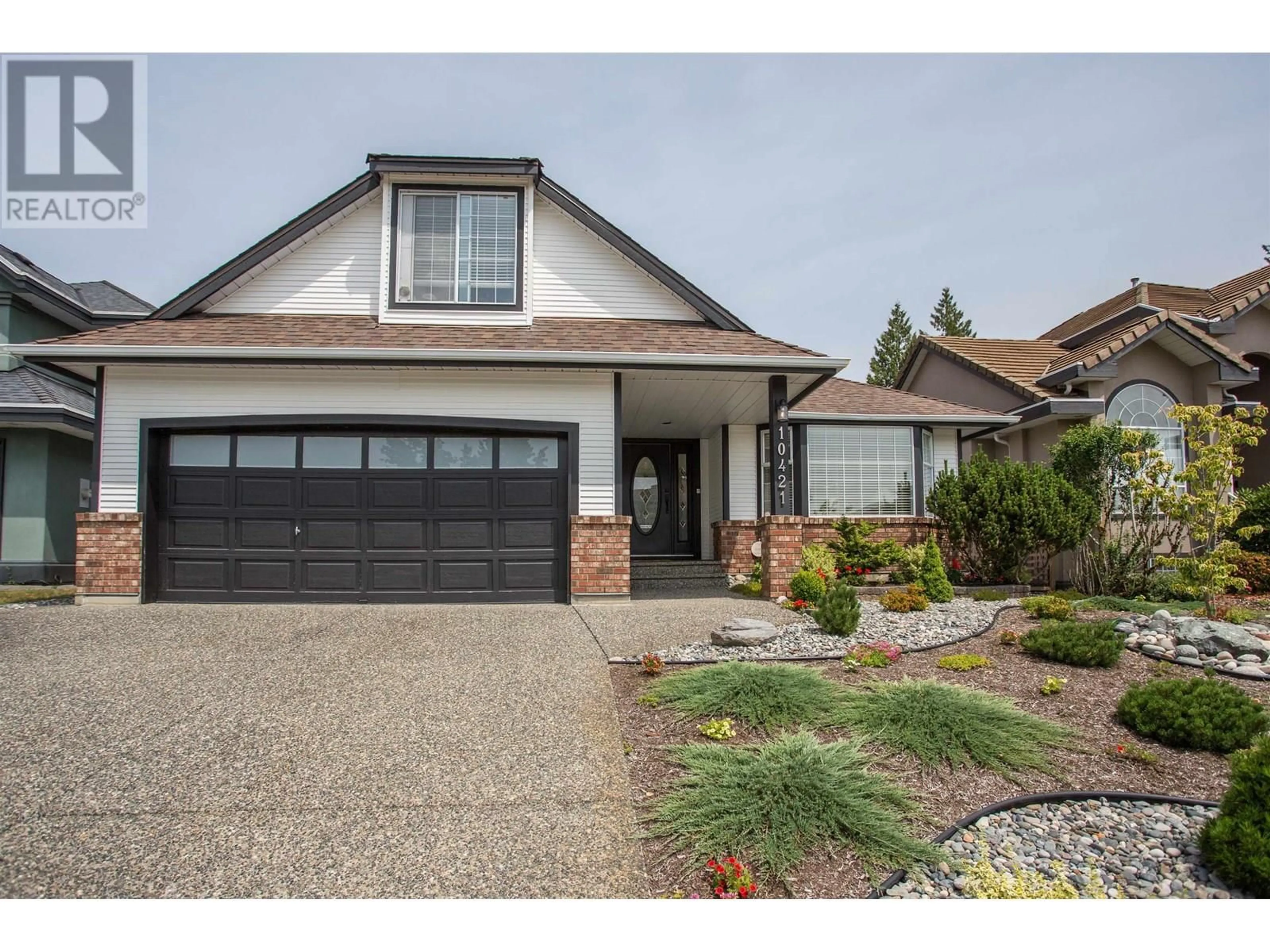 Home with vinyl exterior material, street for 10421 TAMARACK CRESCENT, Maple Ridge British Columbia V2W1B3
