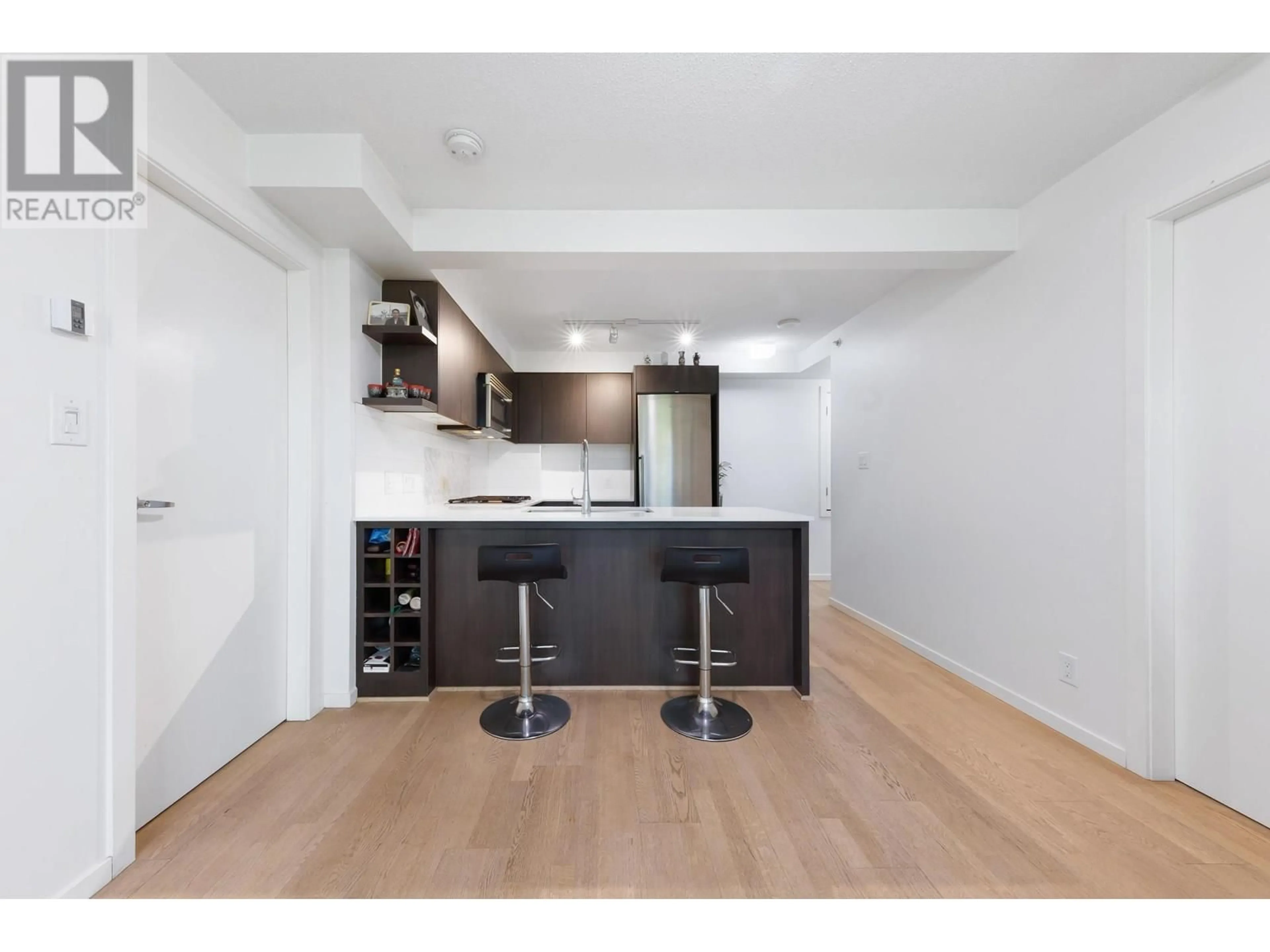 Open concept kitchen, unknown for 602 - 7979 FIRBRIDGE WAY, Richmond British Columbia V6X0K7