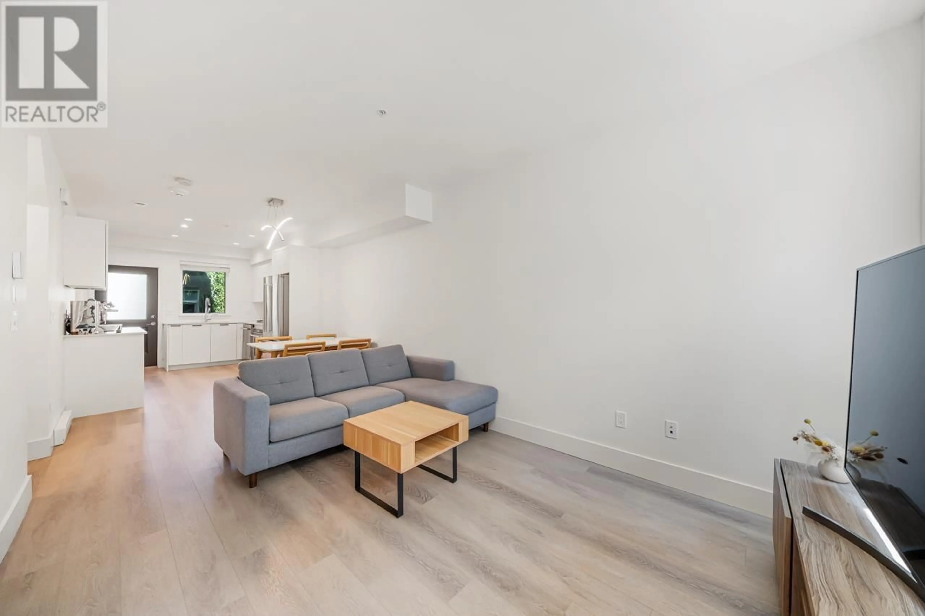 Living room with furniture, unknown for 402 - 6933 ARCOLA STREET, Burnaby British Columbia V5E1H5