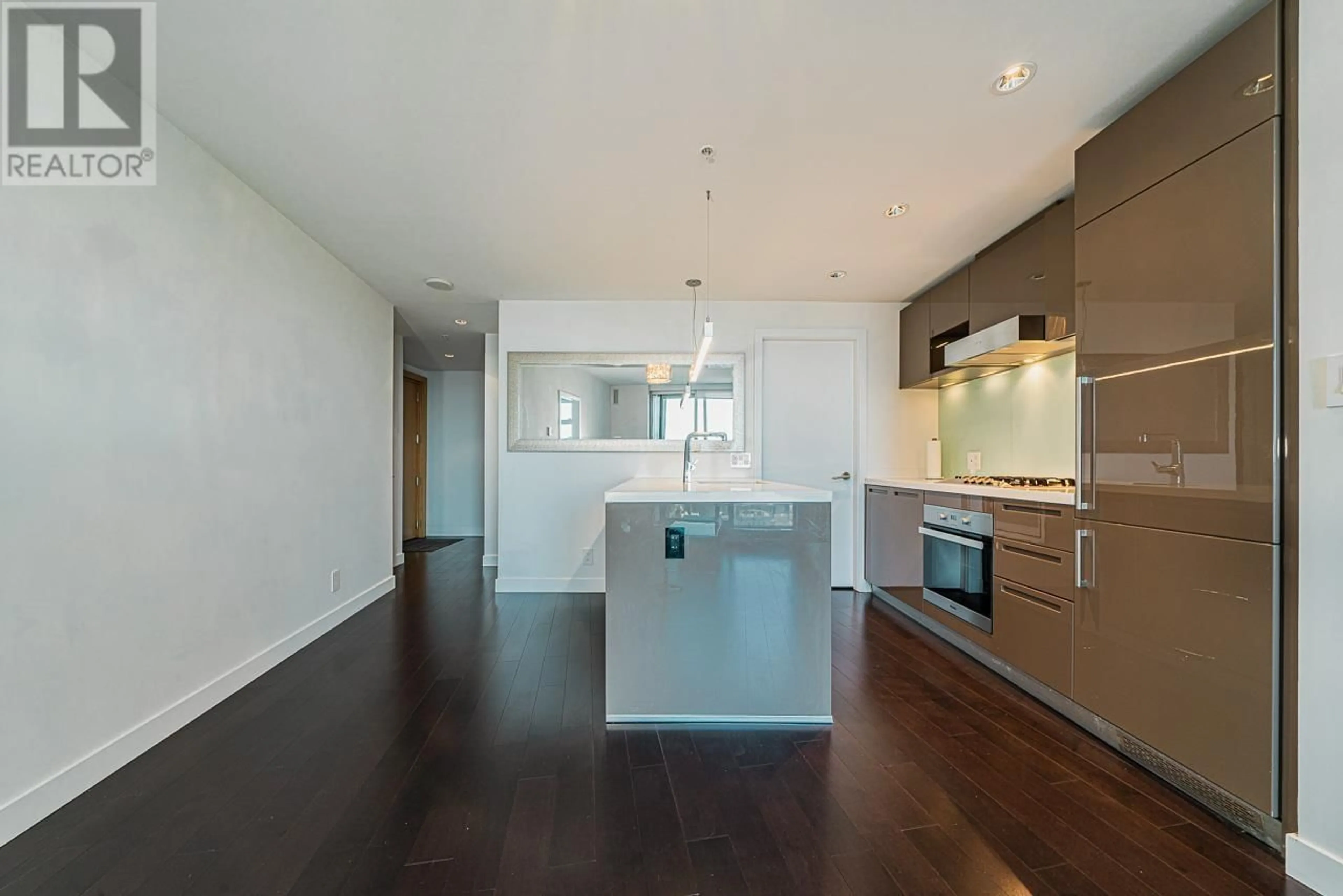 Open concept kitchen, wood/laminate floor for 4201 - 777 RICHARDS STREET, Vancouver British Columbia V6B0M6