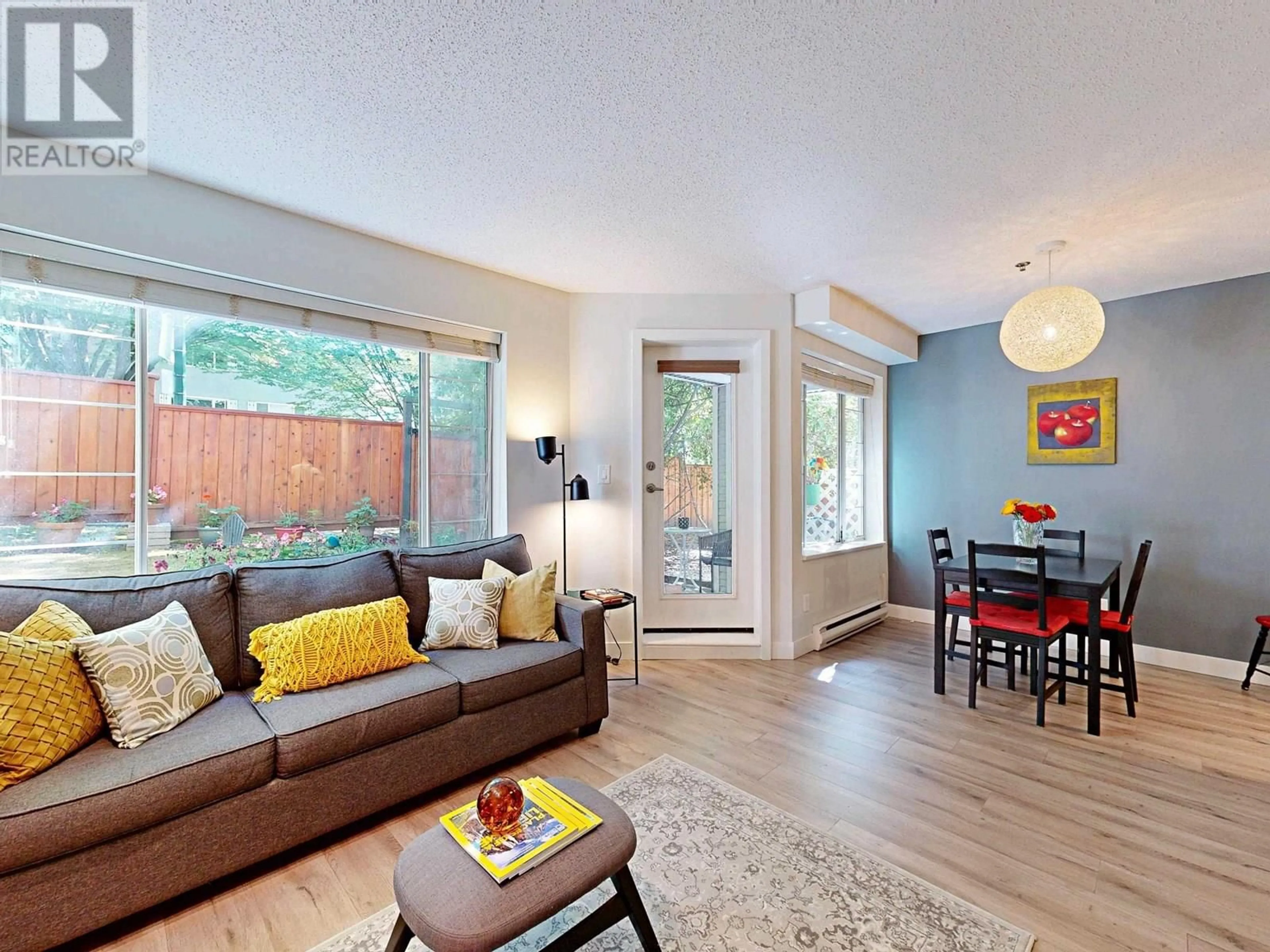 Living room with furniture, wood/laminate floor for 105 - 1433 1ST AVENUE, Vancouver British Columbia V5N1A4