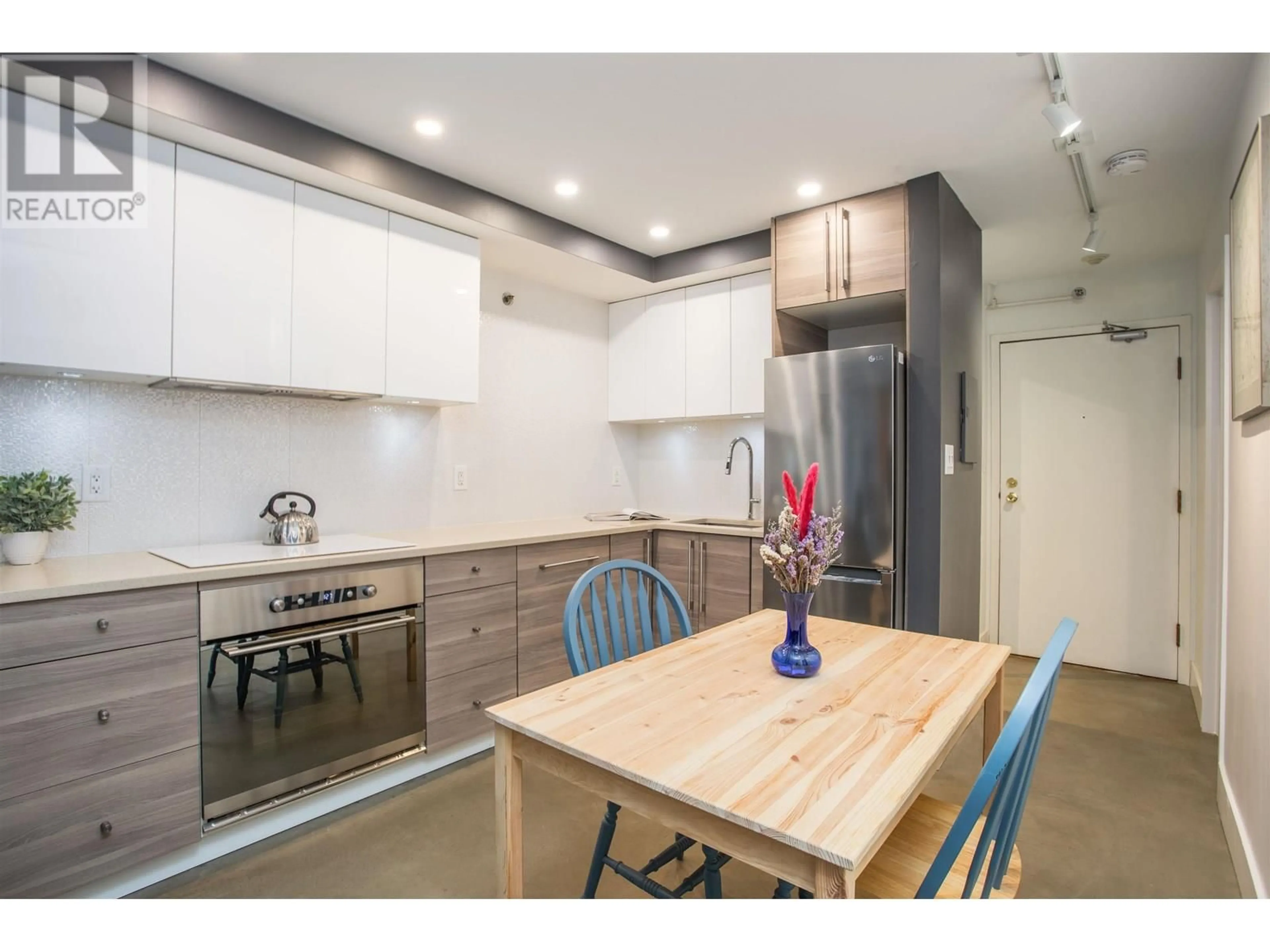 Open concept kitchen, unknown for 104 - 825 7TH AVENUE, Vancouver British Columbia V5T1P4