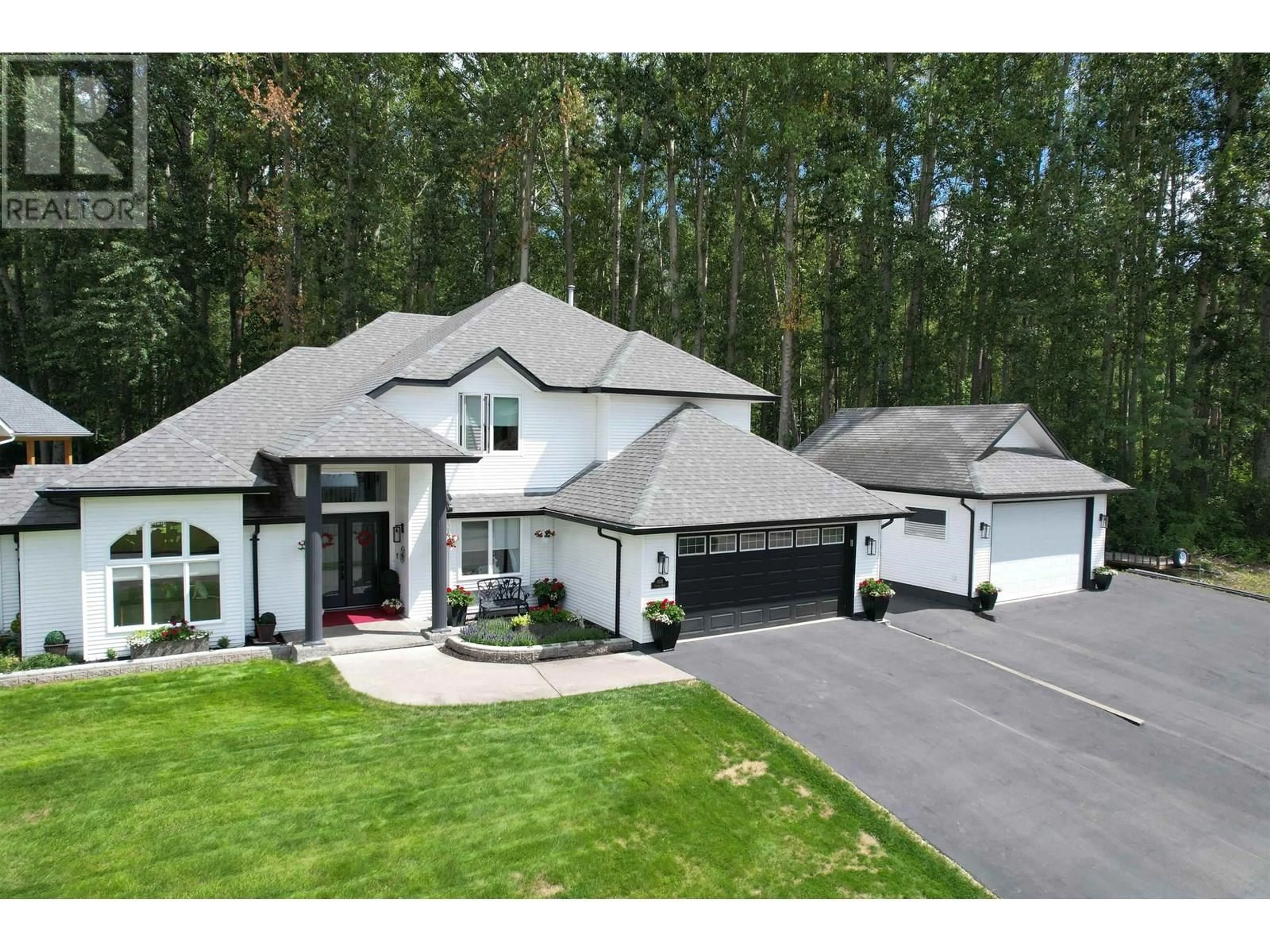 A pic from outside/outdoor area/front of a property/back of a property/a pic from drone, unknown for 108 LAWLOR DRIVE, Quesnel British Columbia V2J5X5