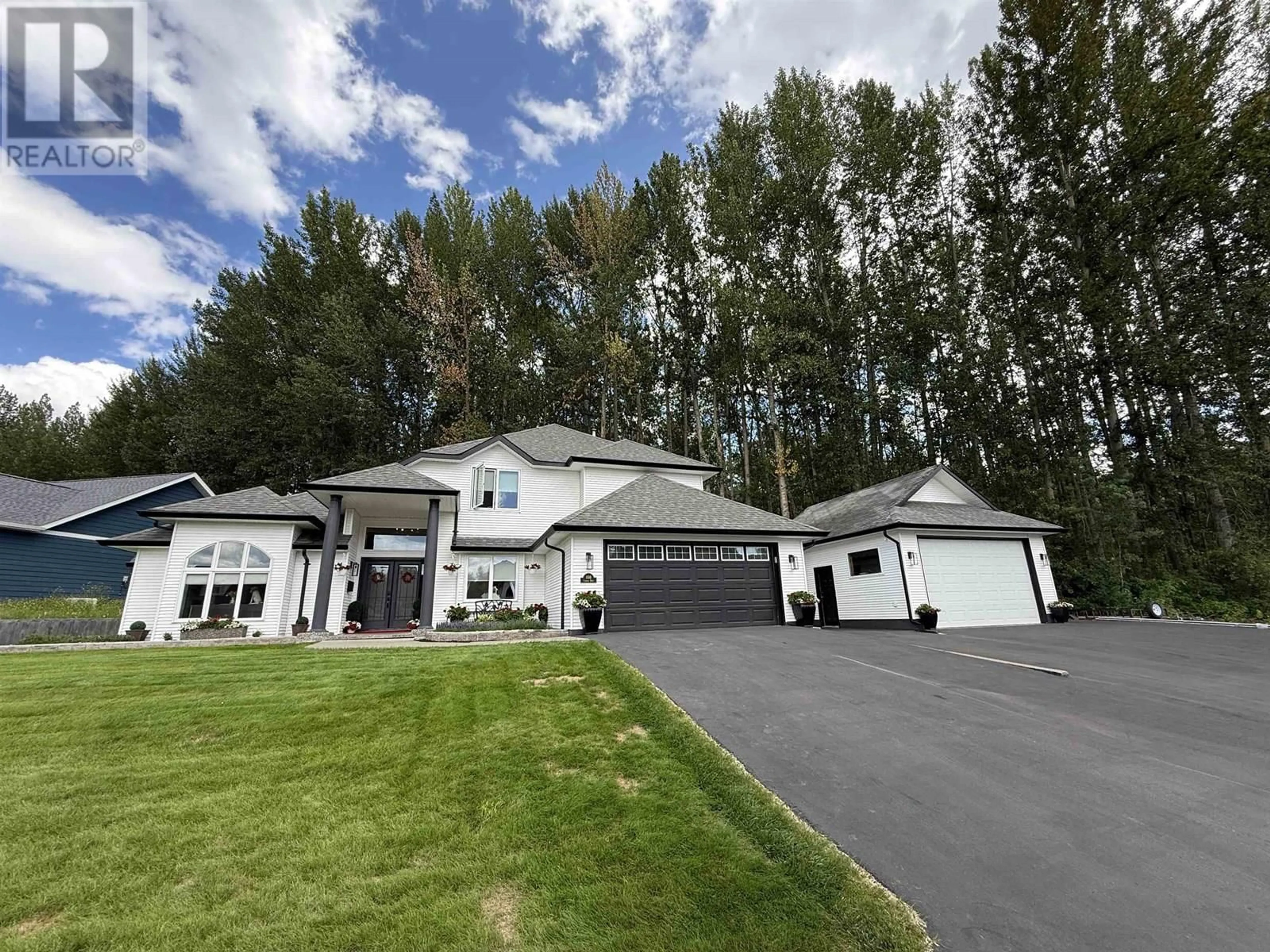A pic from outside/outdoor area/front of a property/back of a property/a pic from drone, mountain view for 108 LAWLOR DRIVE, Quesnel British Columbia V2J5X5