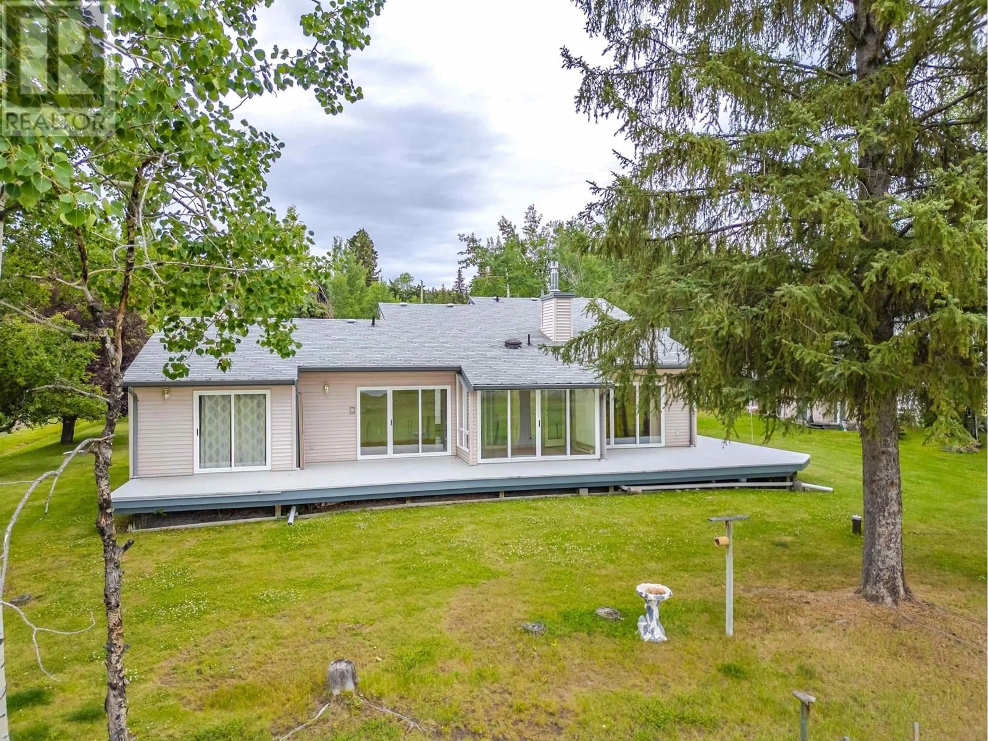 A pic from outside/outdoor area/front of a property/back of a property/a pic from drone, unknown for 6092 LAKESHORE DRIVE, Horse Lake British Columbia V0K2E3