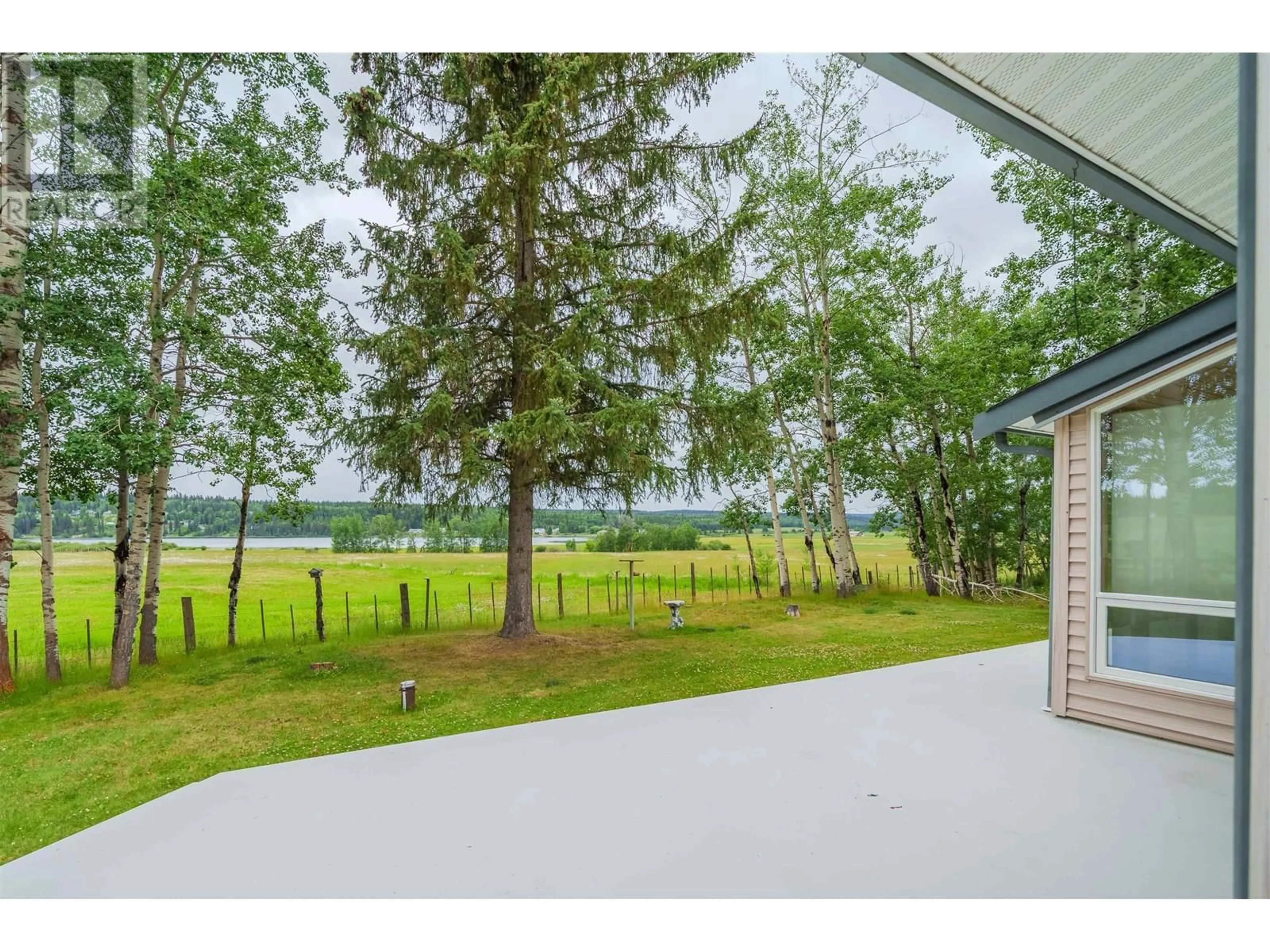 Patio, water/lake/river/ocean view for 6092 LAKESHORE DRIVE, Horse Lake British Columbia V0K2E3