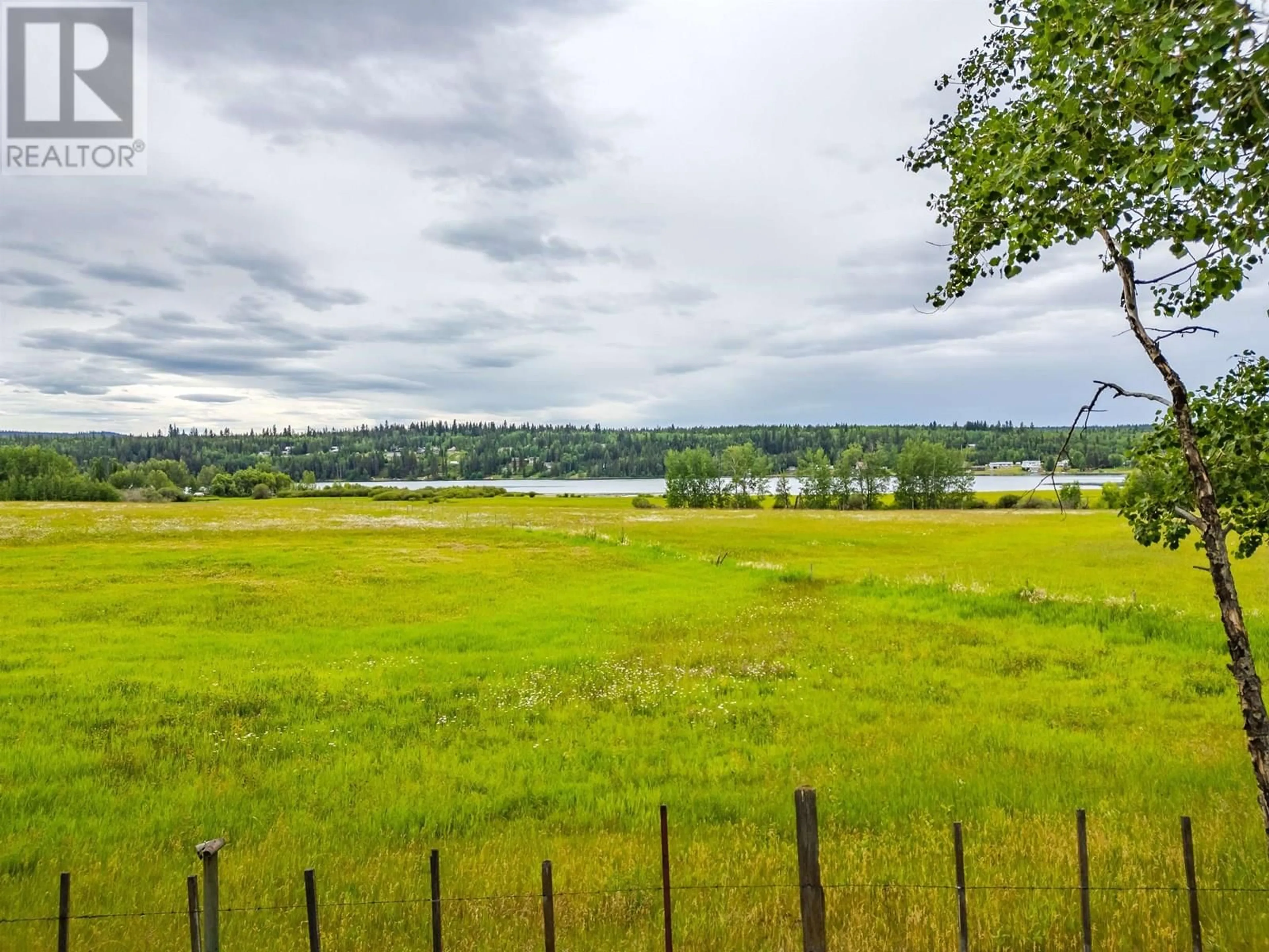 A pic from outside/outdoor area/front of a property/back of a property/a pic from drone, water/lake/river/ocean view for 6092 LAKESHORE DRIVE, Horse Lake British Columbia V0K2E3