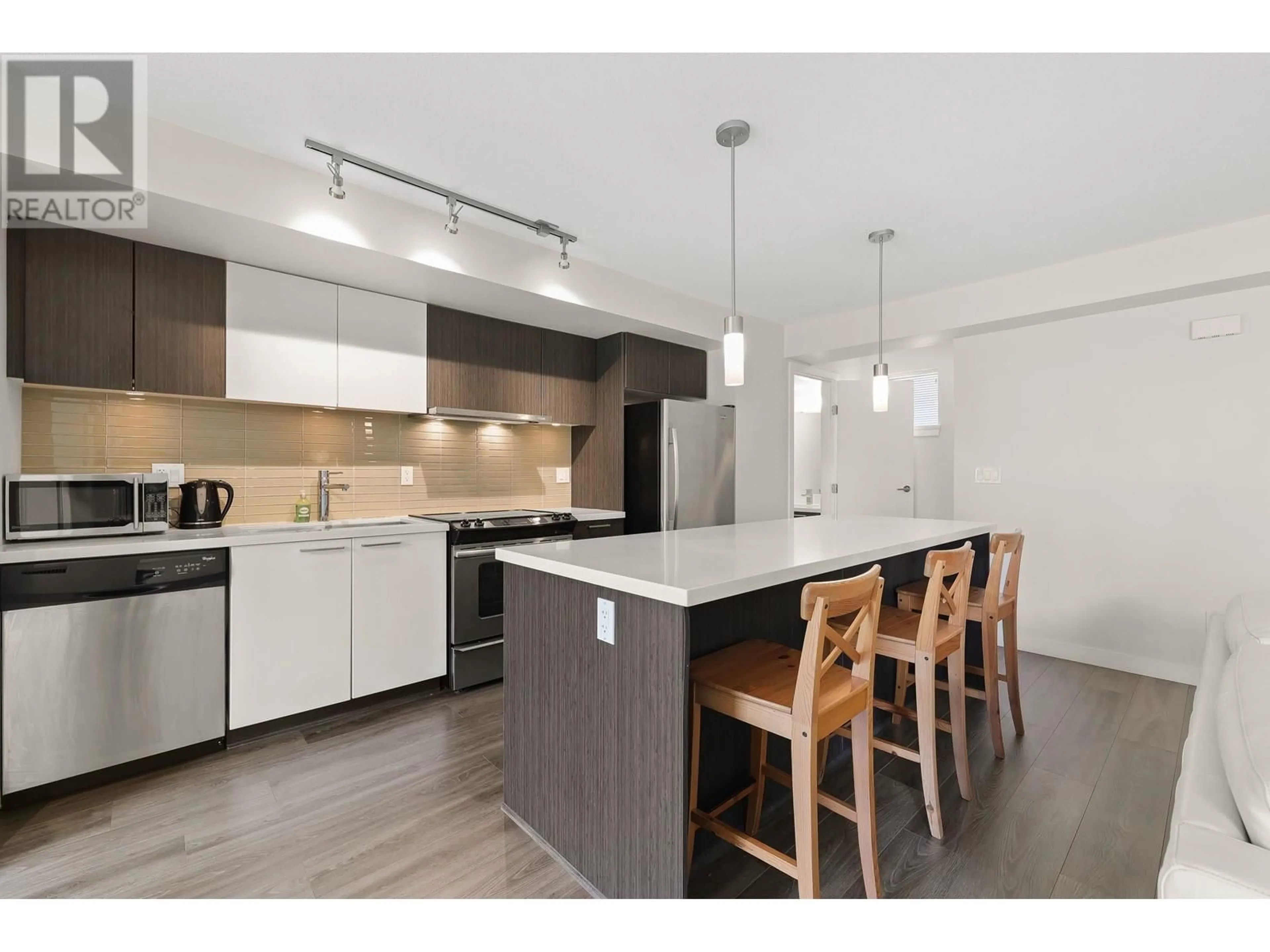 Open concept kitchen, wood/laminate floor for 311 - 618 LANGSIDE AVENUE, Coquitlam British Columbia V3J0B8