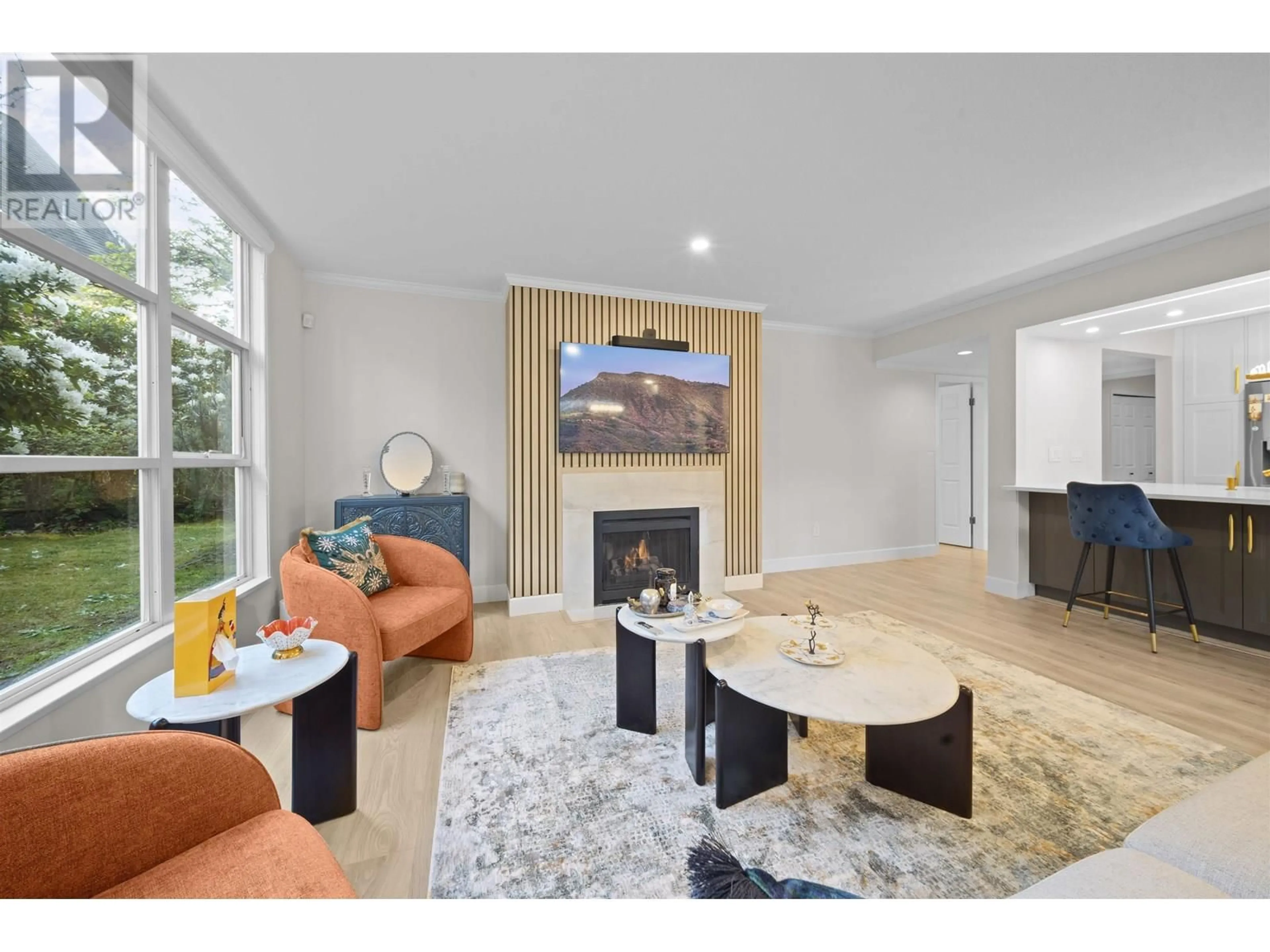 Living room with furniture, unknown for 103 - 3399 CAPILANO CRESCENT, North Vancouver British Columbia V7R4W7