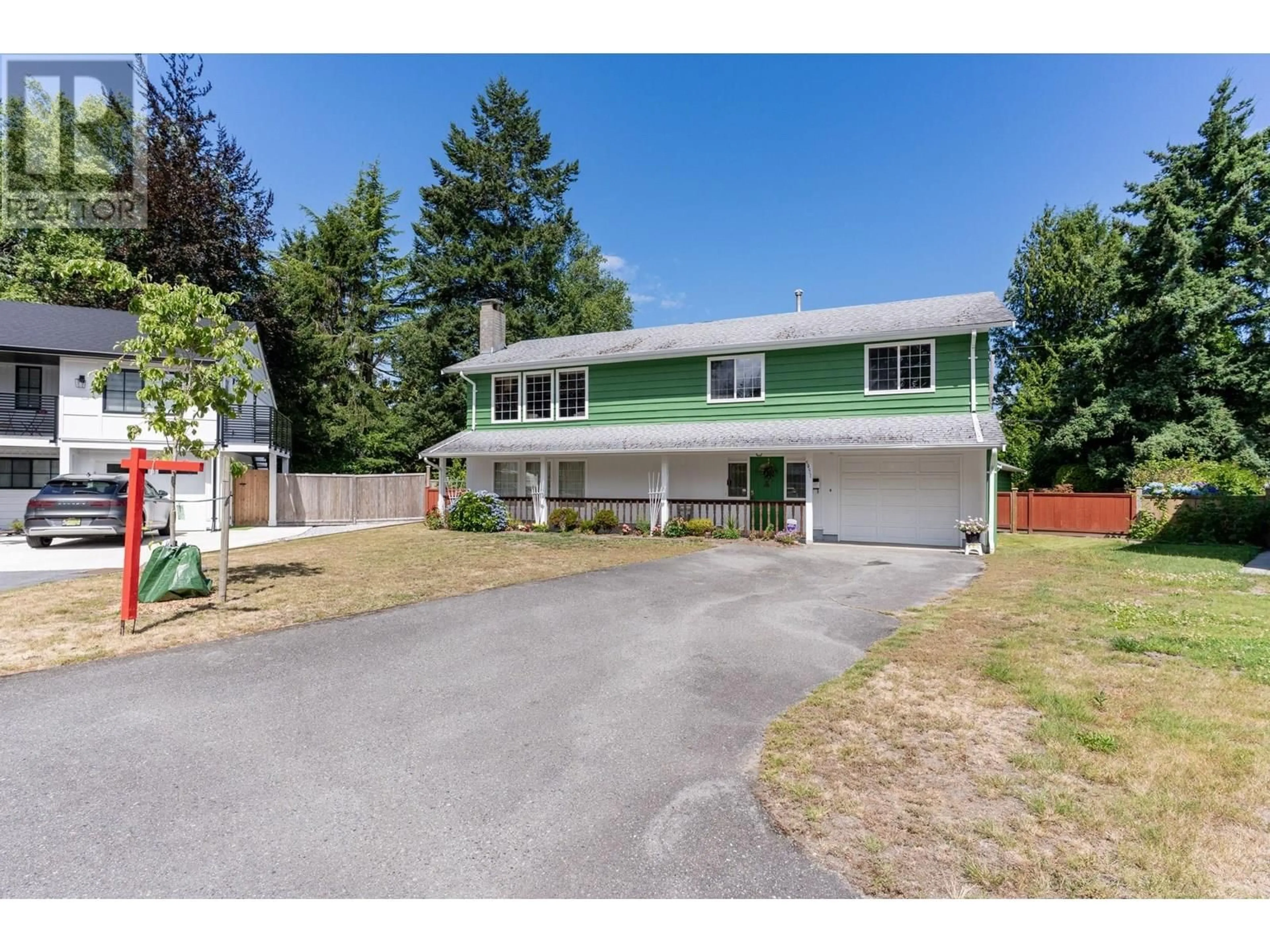 A pic from outside/outdoor area/front of a property/back of a property/a pic from drone, street for 5451 7B AVENUE, Delta British Columbia V4M1S7
