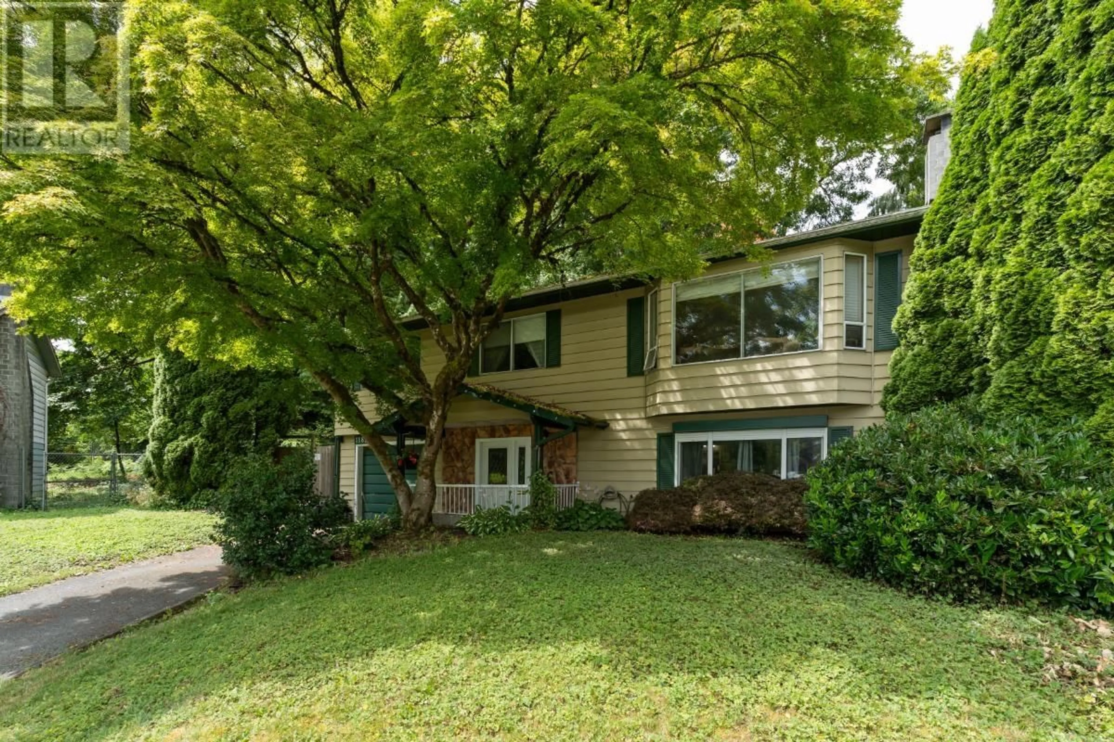 Home with vinyl exterior material, street for 11829 218 STREET, Maple Ridge British Columbia V2X7W1