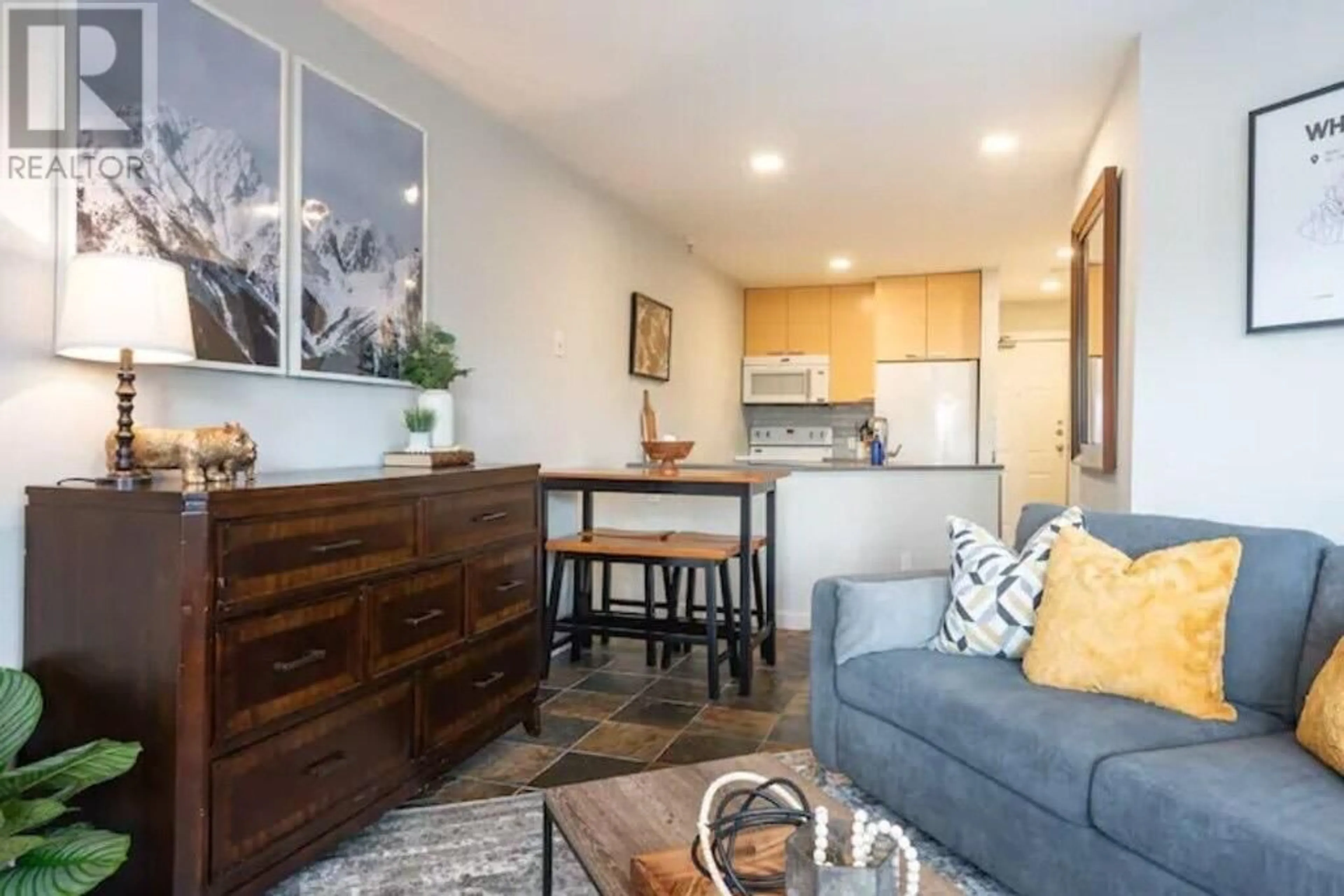 Living room with furniture, wood/laminate floor for 254 - 4340 LORIMER ROAD, Whistler British Columbia V8E1A5