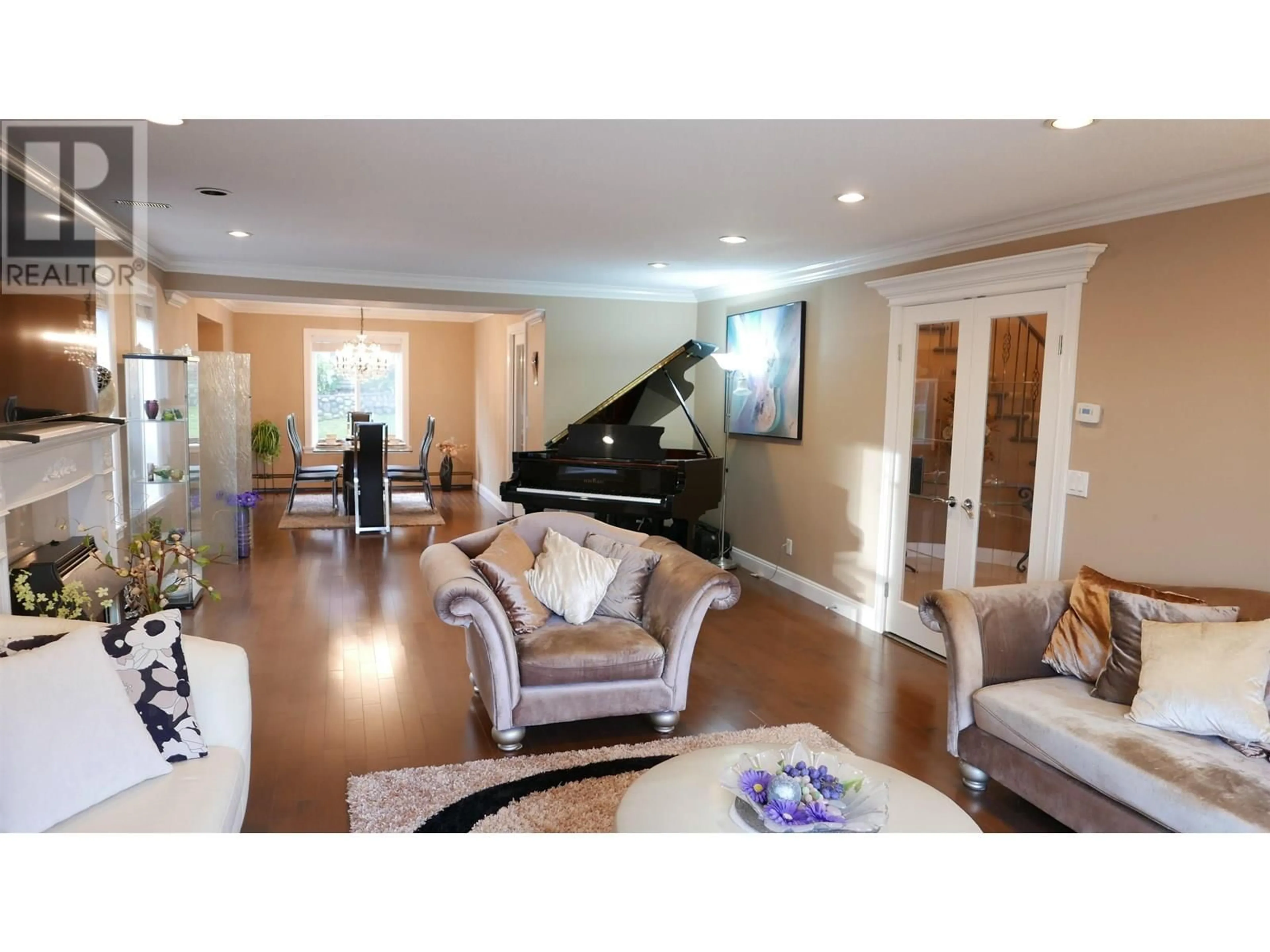 Living room with furniture, wood/laminate floor for 7625 AUBREY STREET, Burnaby British Columbia V5A1K6