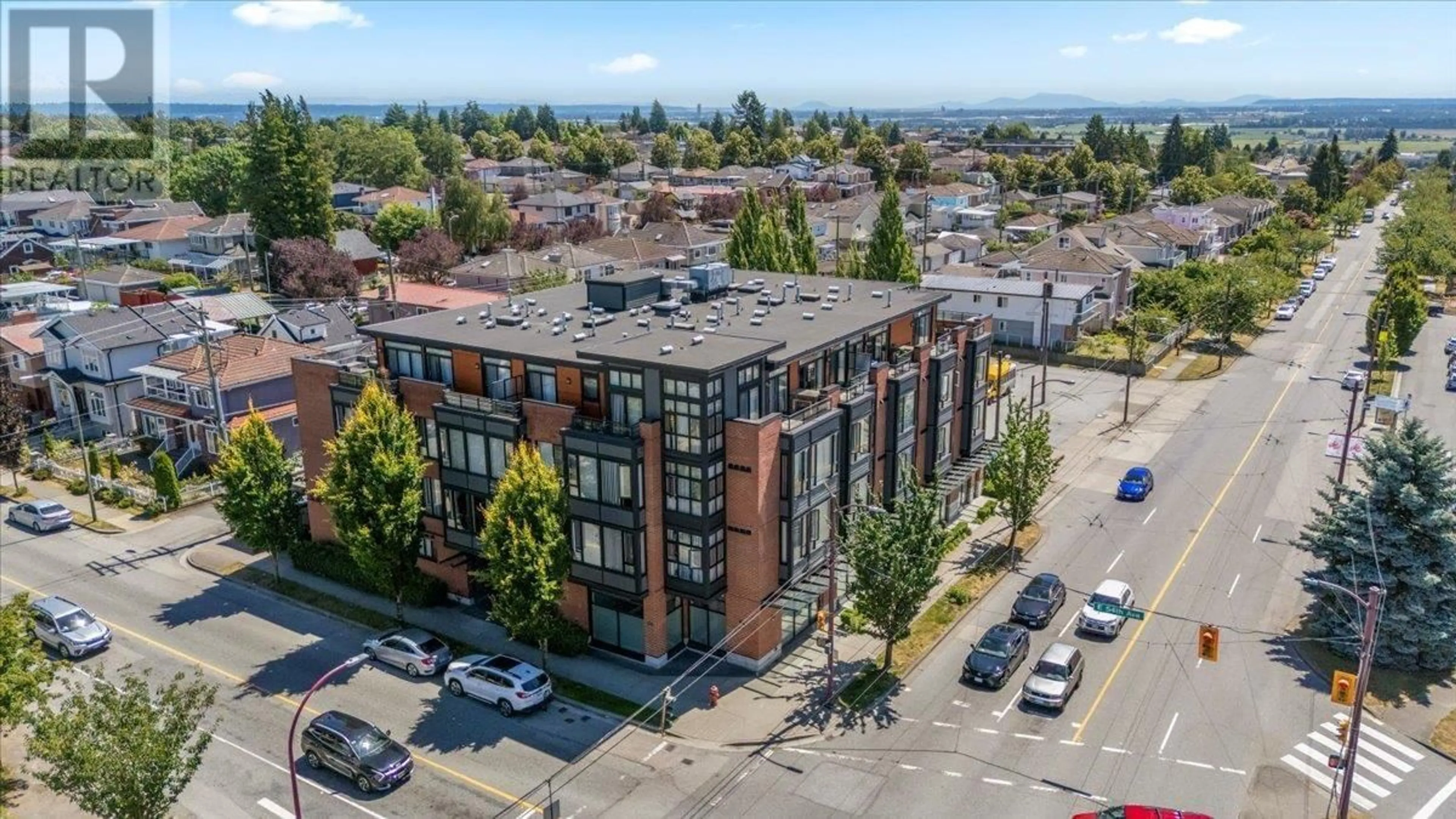 A pic from outside/outdoor area/front of a property/back of a property/a pic from drone, unknown for 211 - 2008 54TH AVENUE, Vancouver British Columbia V5P1Y6