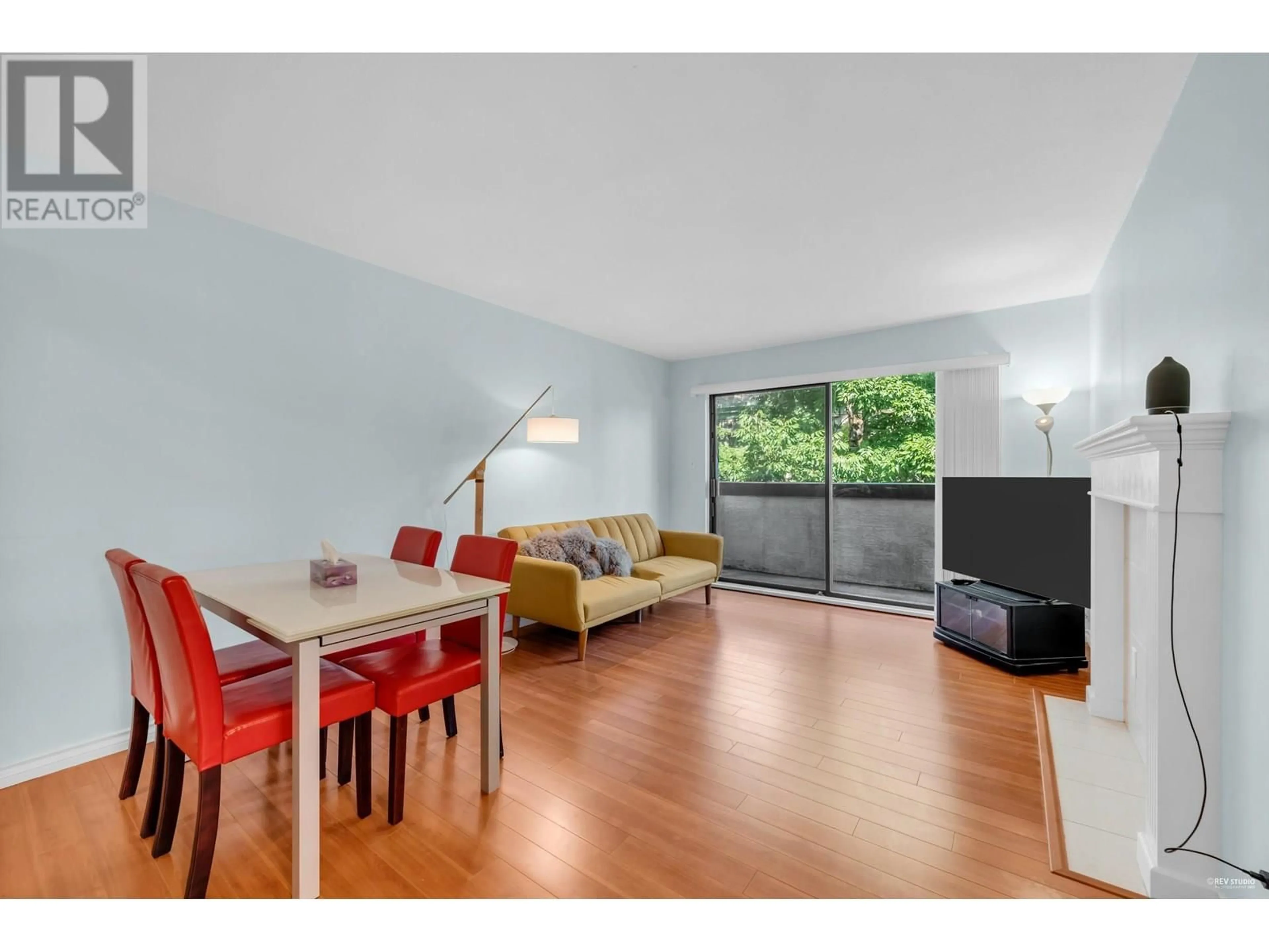 Living room with furniture, wood/laminate floor for 217 - 7480 ST. ALBANS ROAD, Richmond British Columbia V6Y2K6