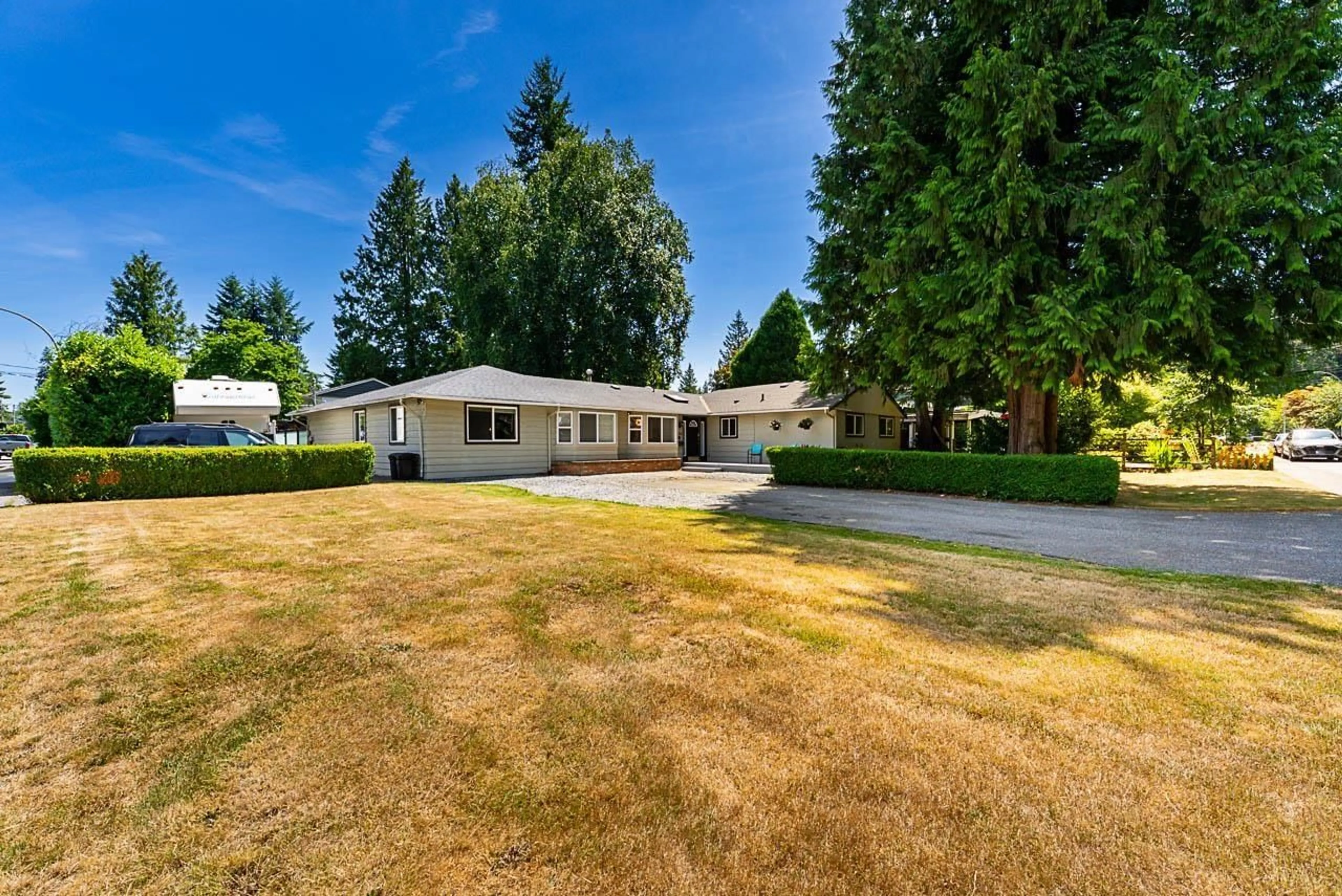 A pic from outside/outdoor area/front of a property/back of a property/a pic from drone, street for 4566 206A, Langley British Columbia V3A2C8