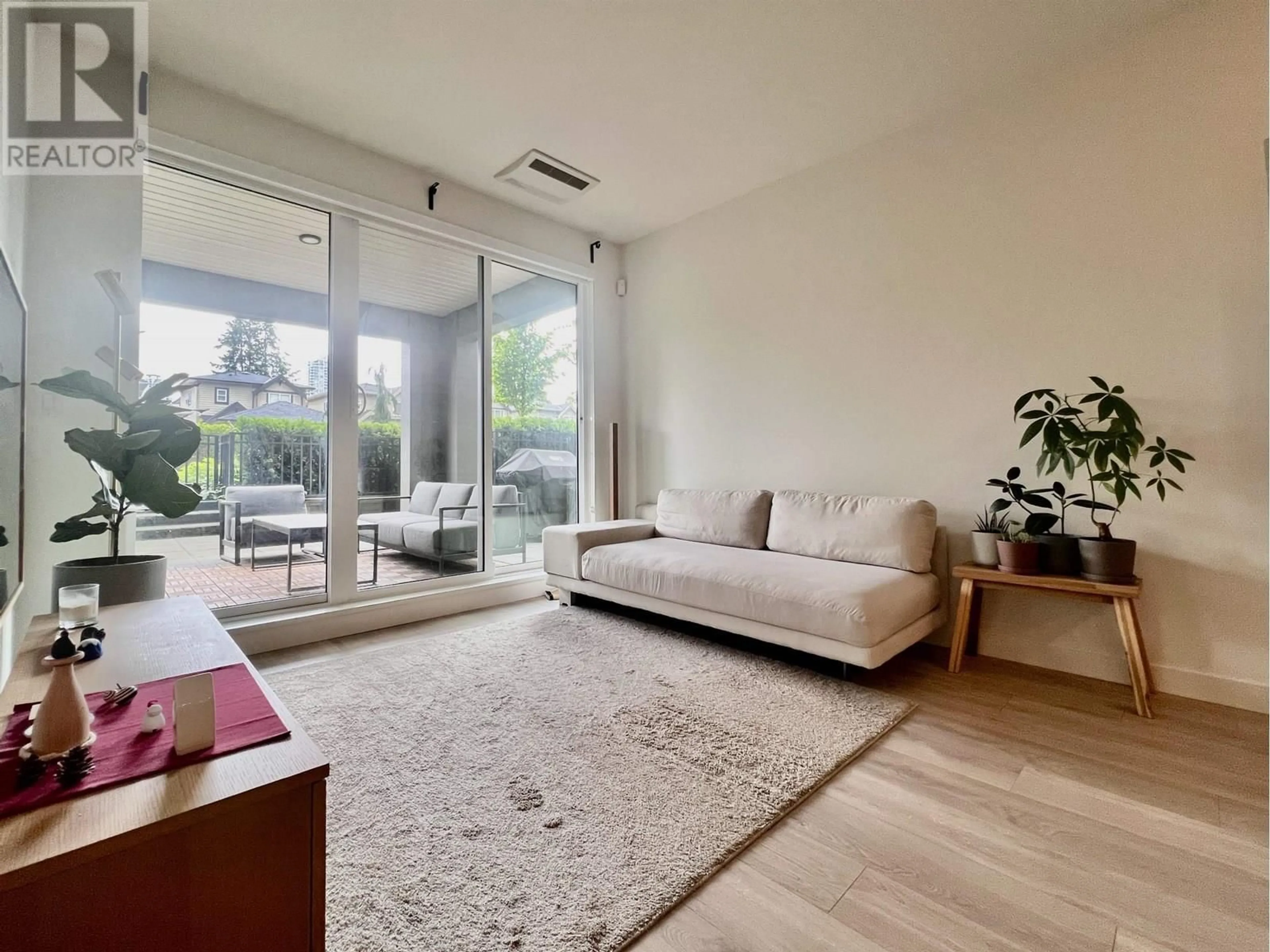 Living room with furniture, unknown for 106 - 7588 16TH STREET, Burnaby British Columbia V3N0H8