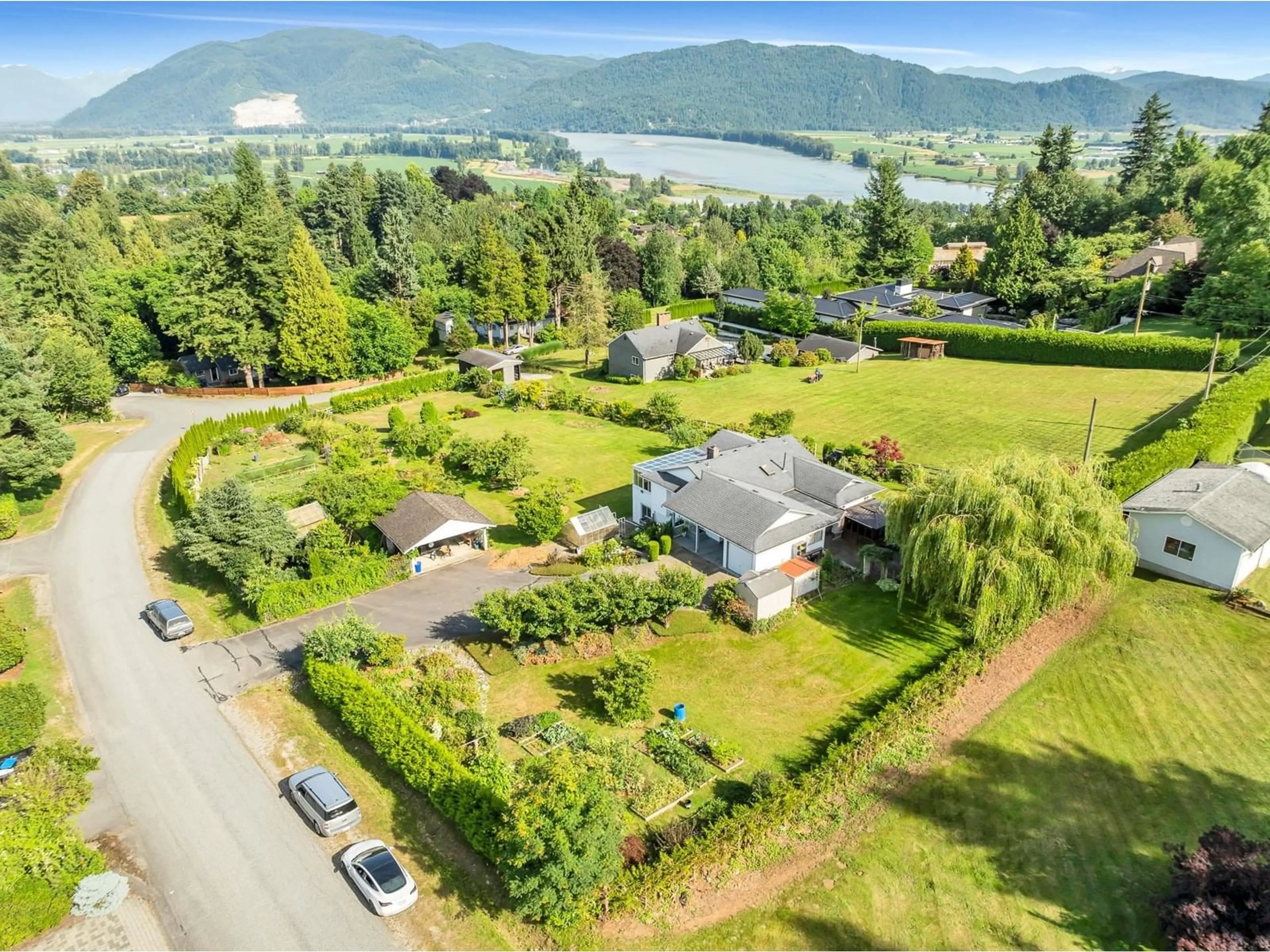 A pic from outside/outdoor area/front of a property/back of a property/a pic from drone, water/lake/river/ocean view for 34578 IRELAND, Mission British Columbia V2V6W1