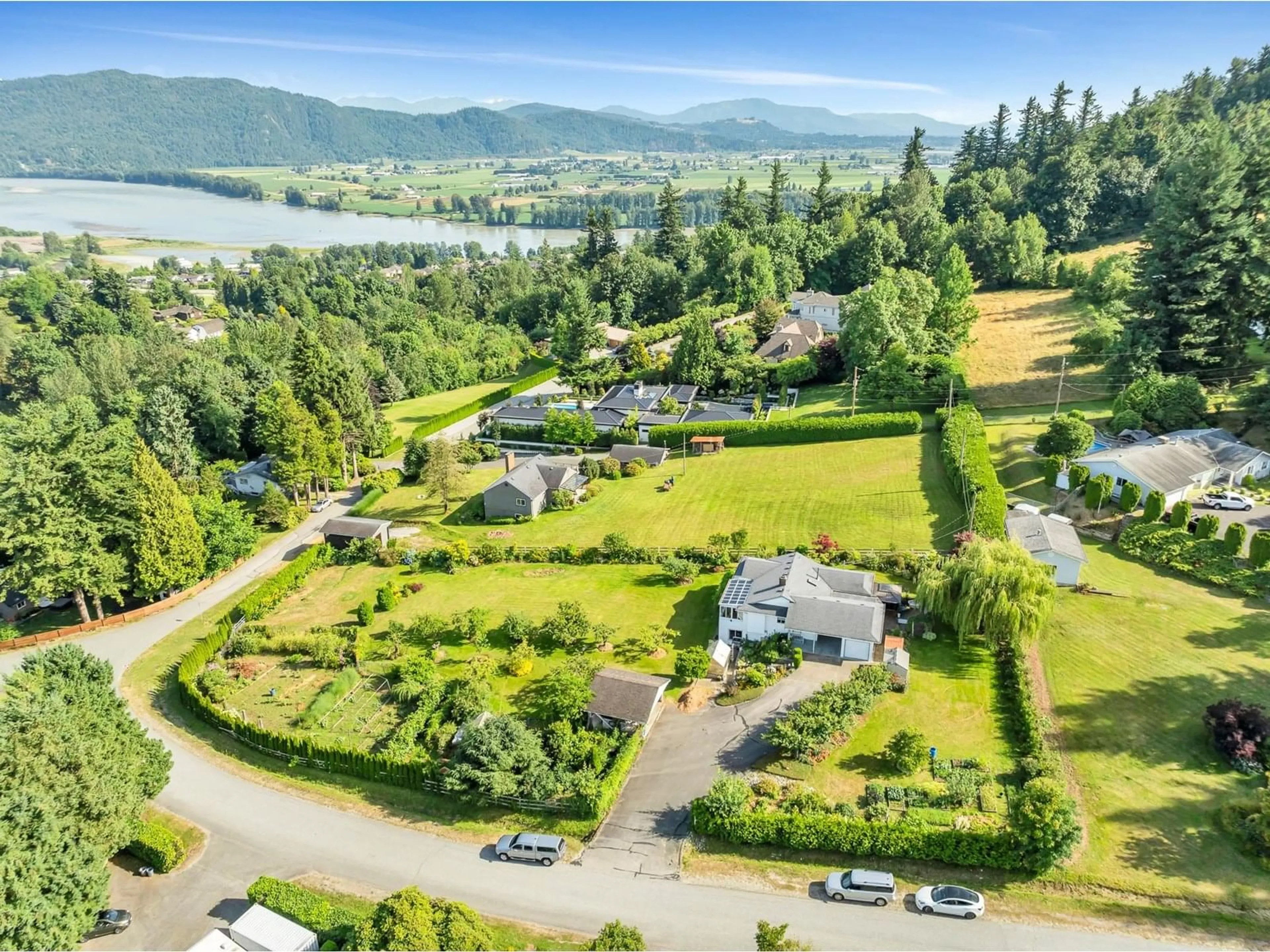 A pic from outside/outdoor area/front of a property/back of a property/a pic from drone, water/lake/river/ocean view for 34578 IRELAND, Mission British Columbia V2V6W1