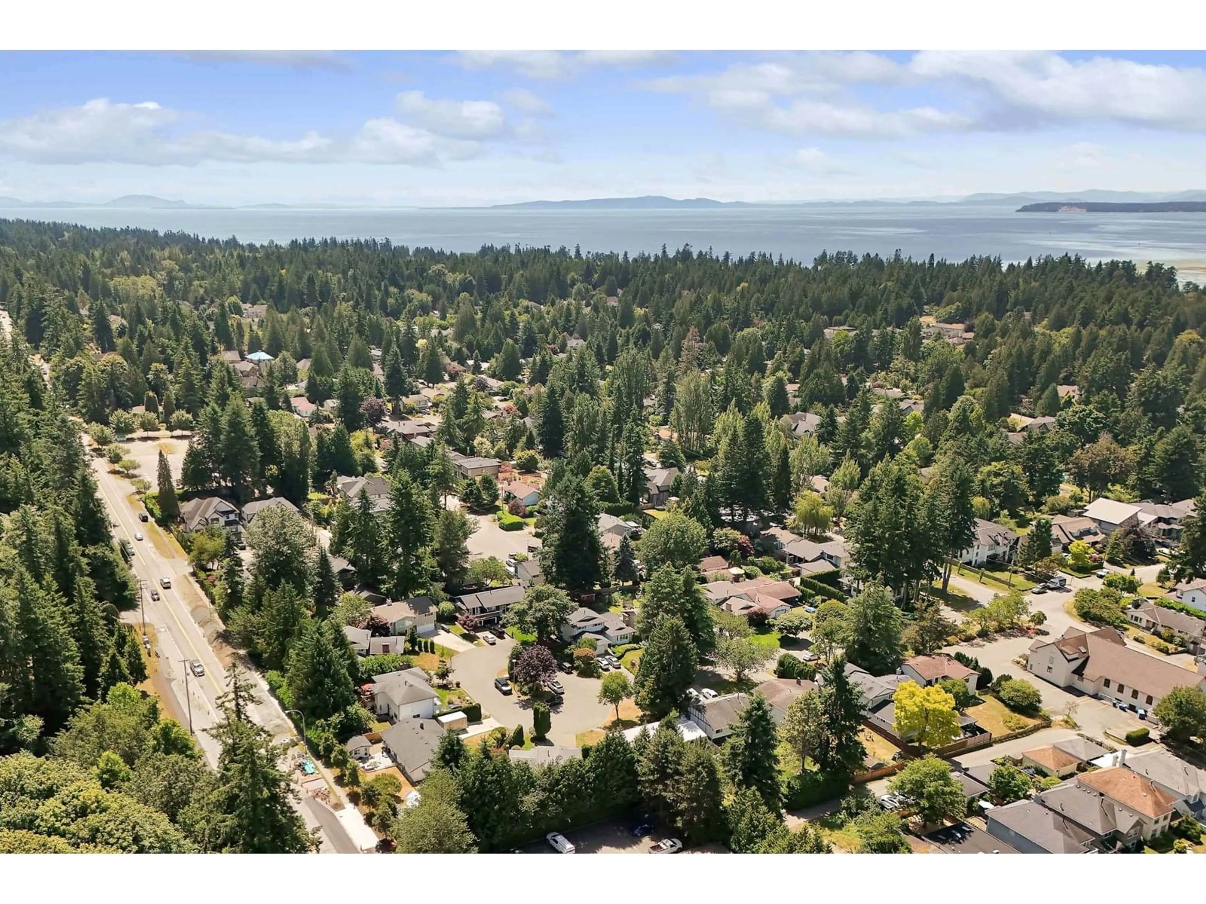 A pic from outside/outdoor area/front of a property/back of a property/a pic from drone, forest/trees view for 12767 27A, Surrey British Columbia V4A2N5
