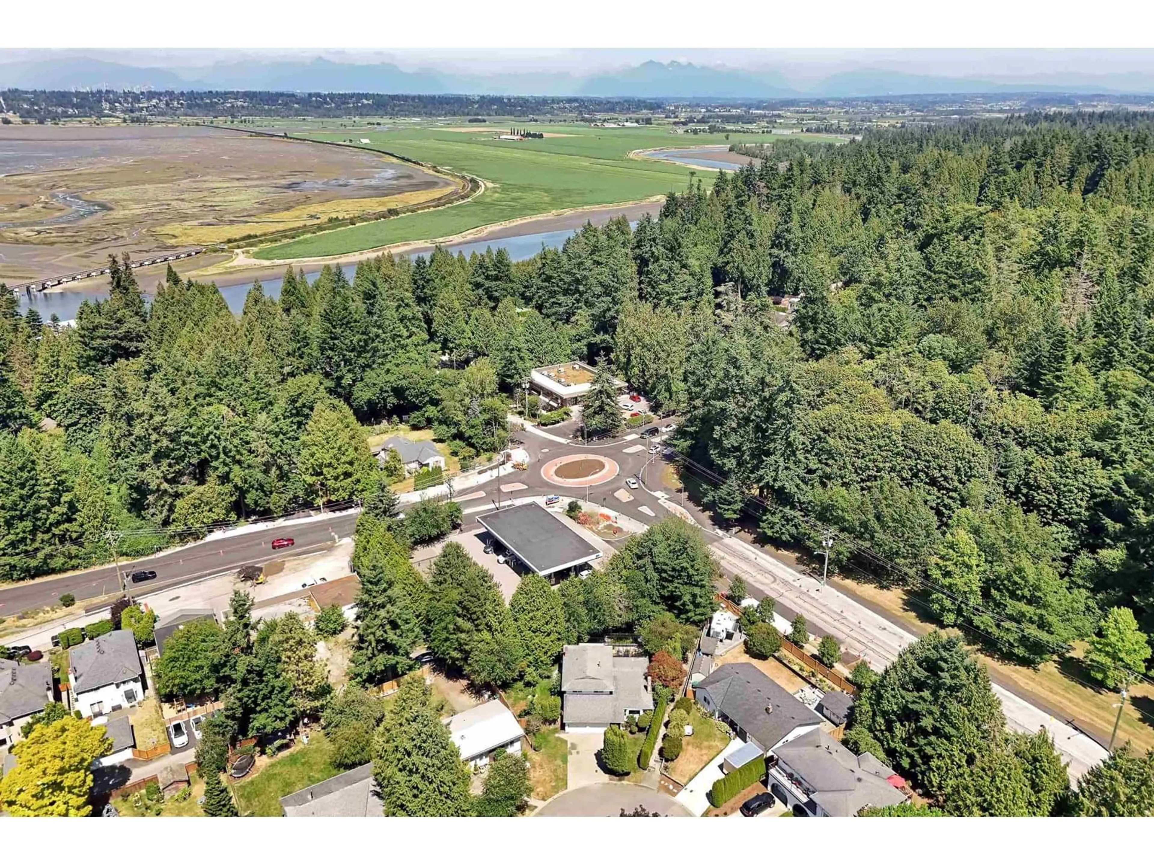 A pic from outside/outdoor area/front of a property/back of a property/a pic from drone, water/lake/river/ocean view for 12767 27A, Surrey British Columbia V4A2N5