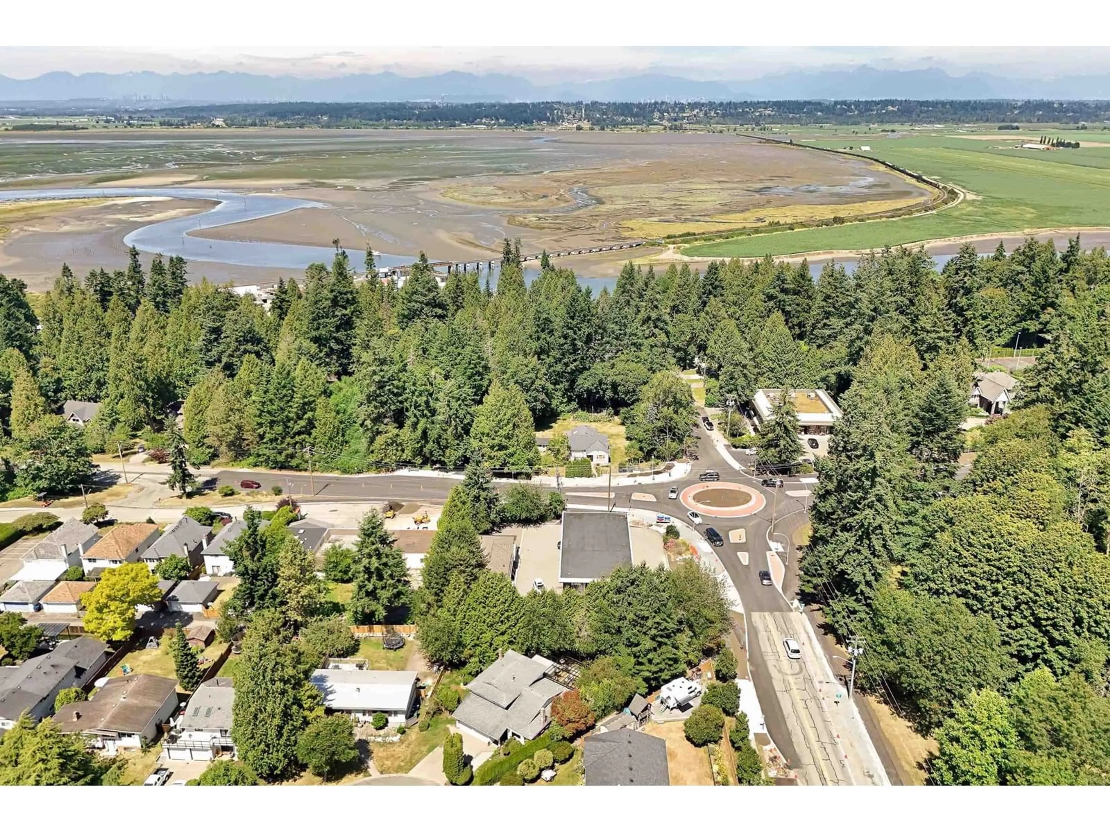 A pic from outside/outdoor area/front of a property/back of a property/a pic from drone, water/lake/river/ocean view for 12767 27A, Surrey British Columbia V4A2N5