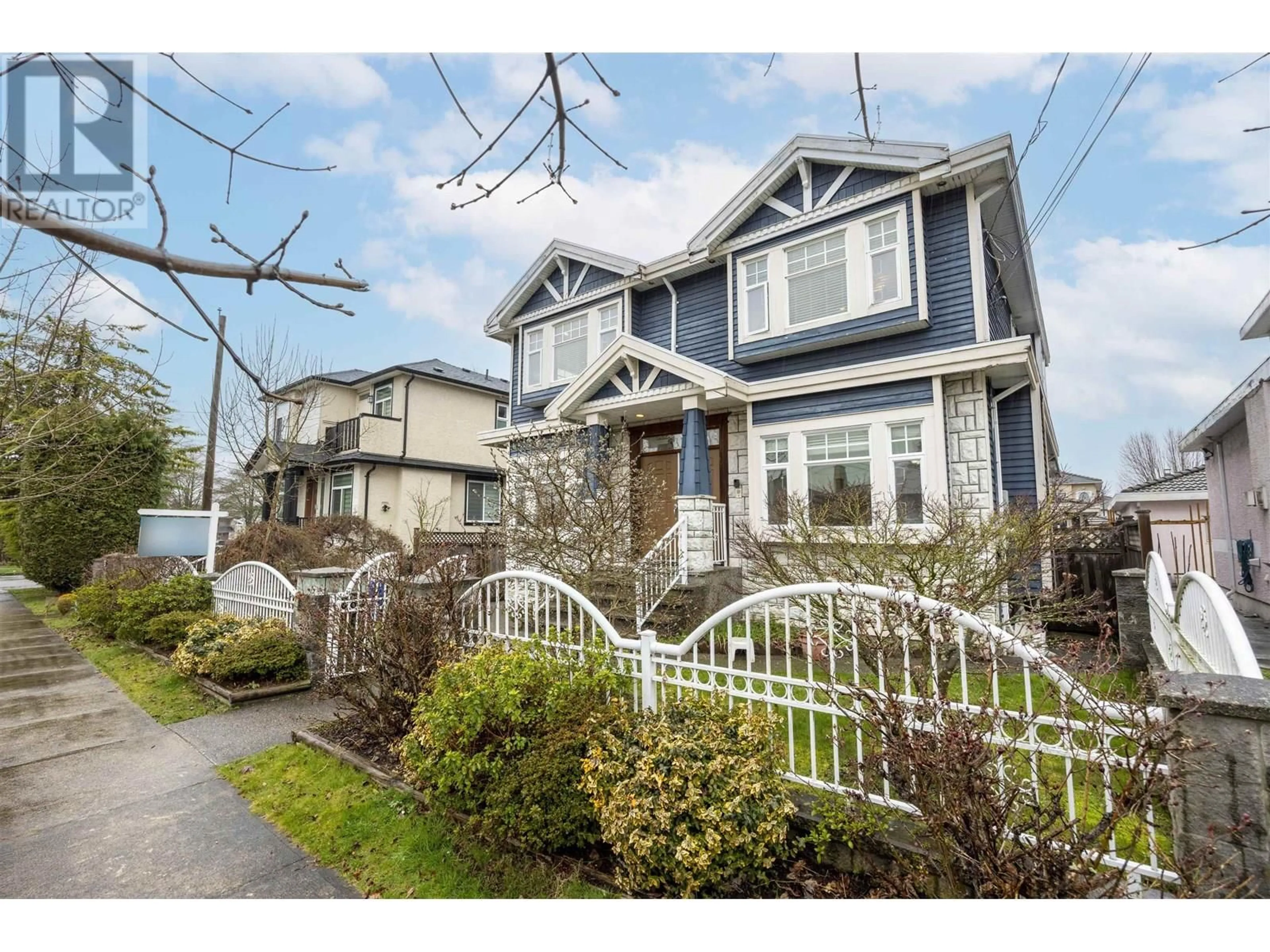 Home with vinyl exterior material, street for 3311 44TH AVENUE, Vancouver British Columbia V5R3B3