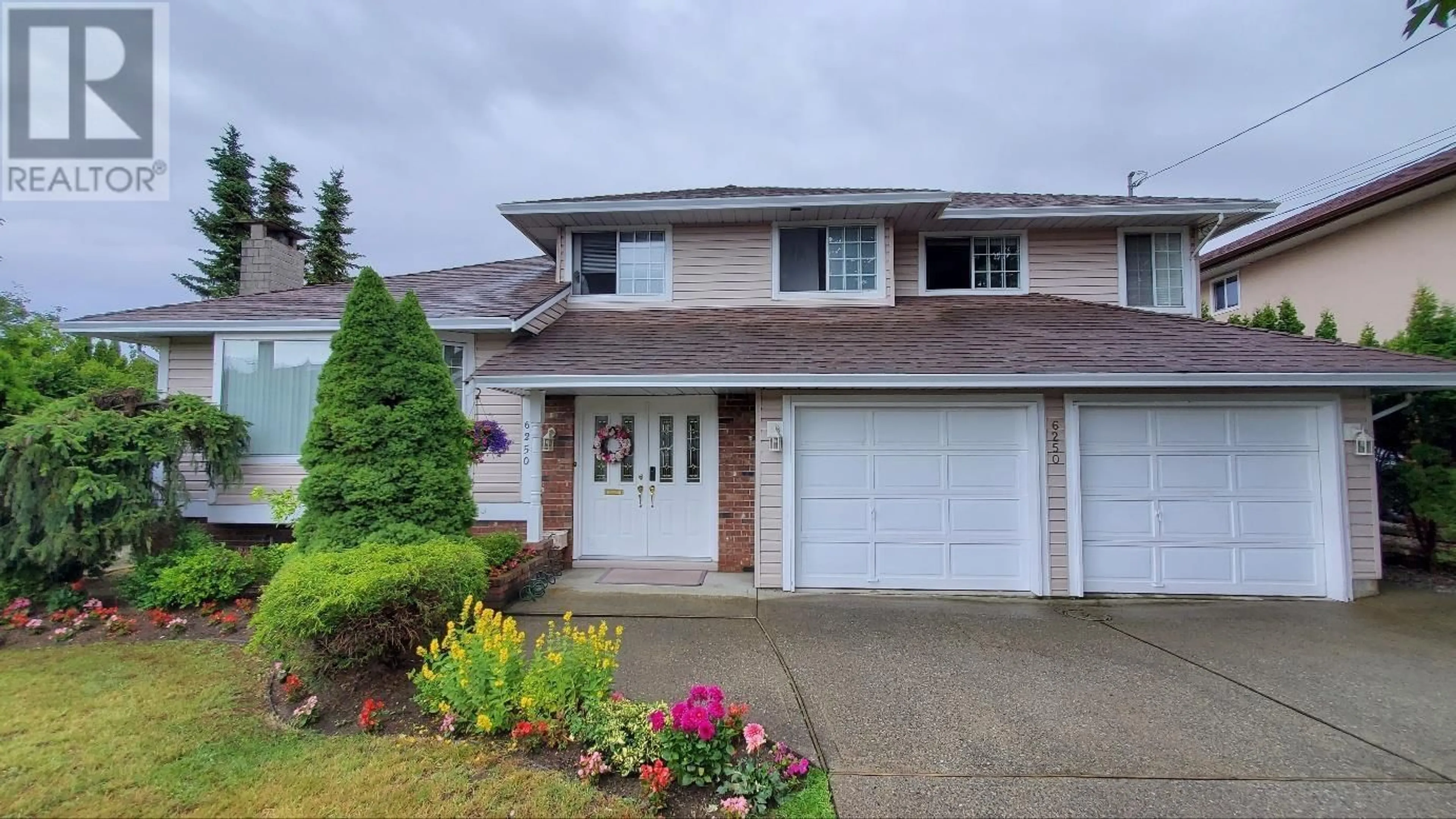 Home with vinyl exterior material, street for 6250 CLINTON STREET, Burnaby British Columbia V5J2M7