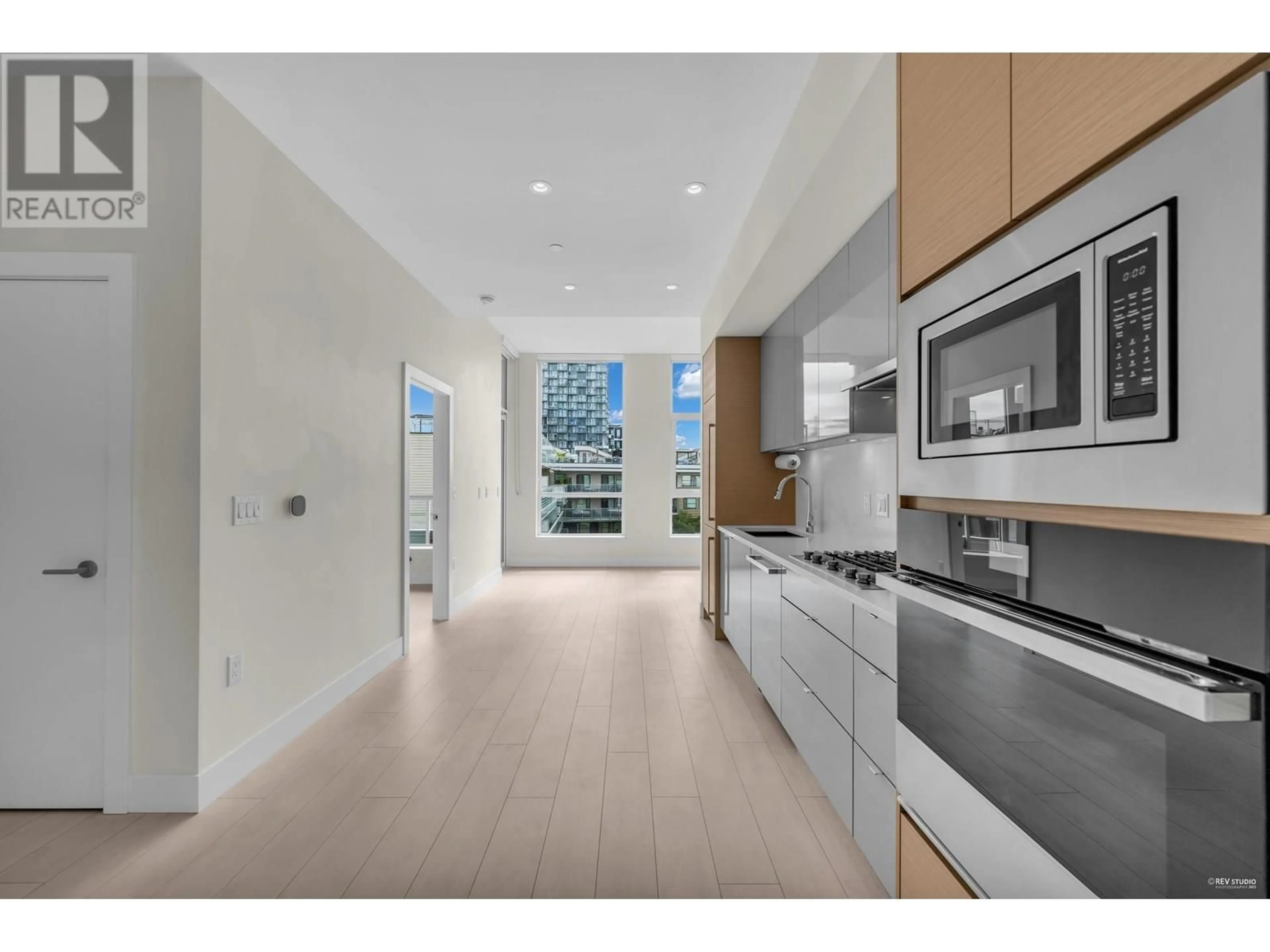 Open concept kitchen, unknown for 601 - 3438 SAWMILL CRESCENT, Vancouver British Columbia V5S0E3