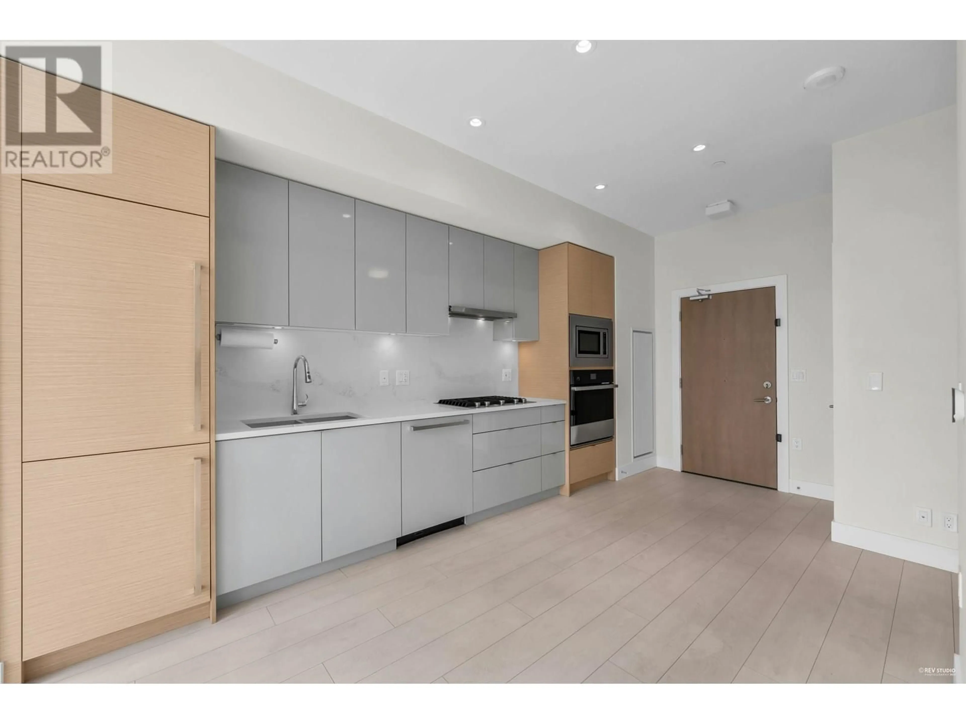 Open concept kitchen, unknown for 601 - 3438 SAWMILL CRESCENT, Vancouver British Columbia V5S0E3