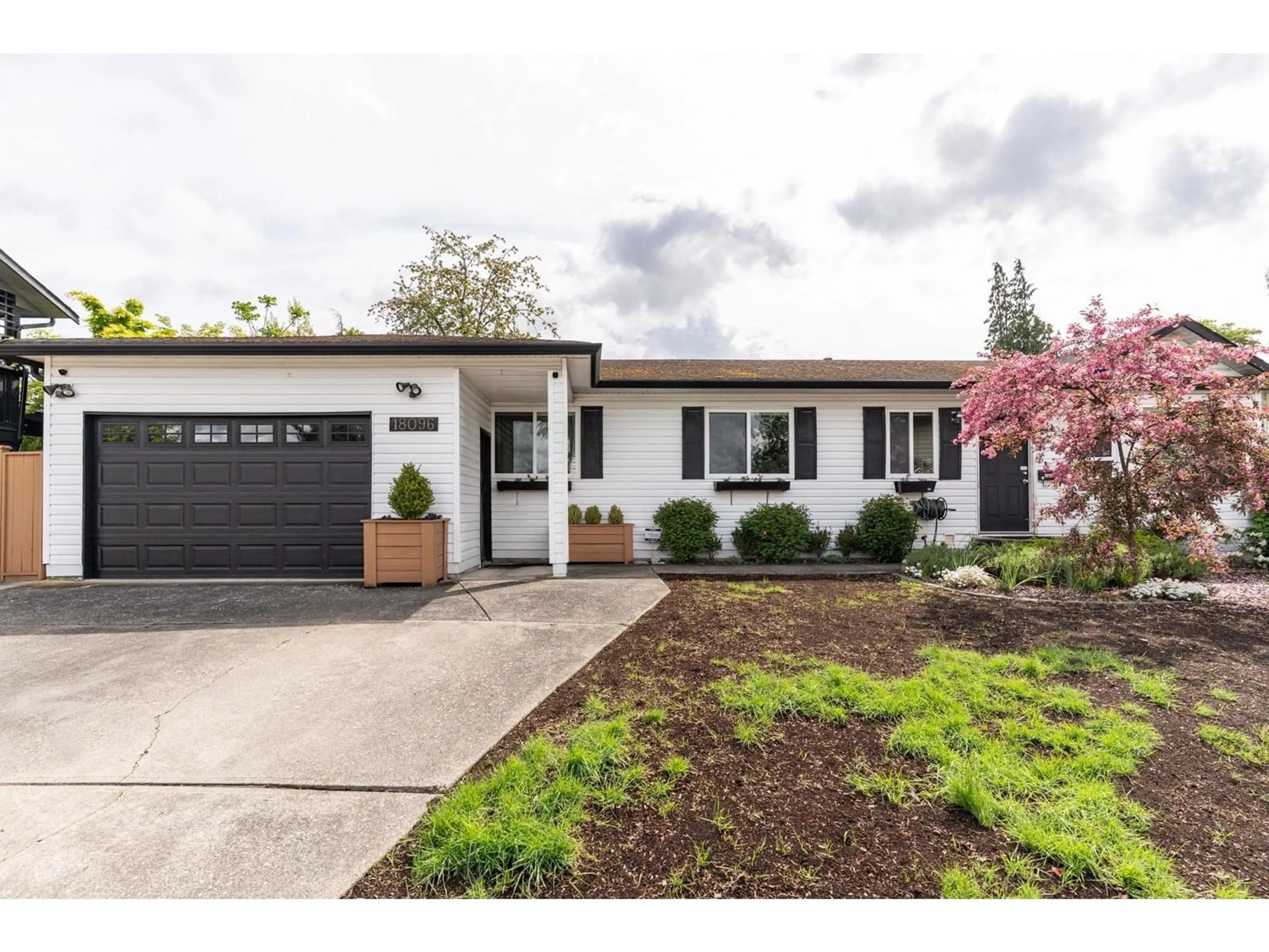 Home with vinyl exterior material, street for 18096 61, Surrey British Columbia V3S5V8
