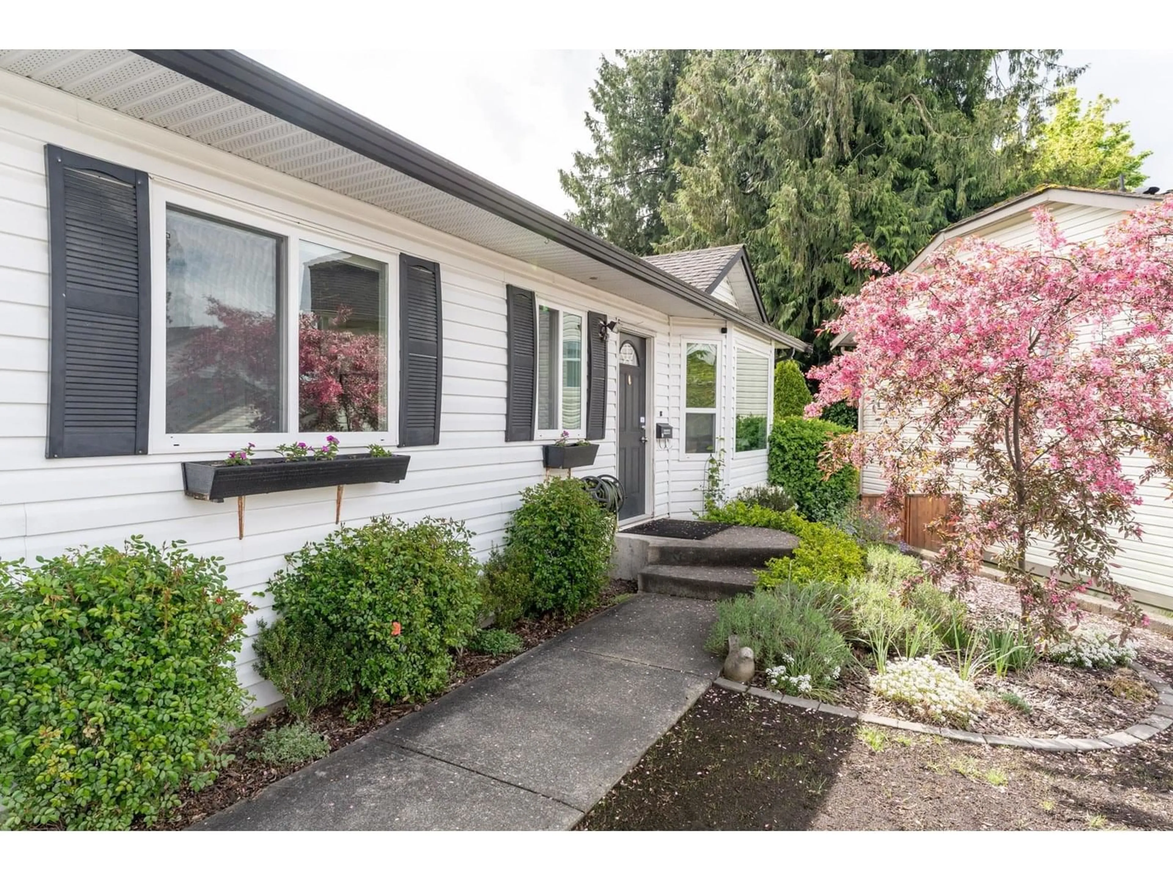 Home with vinyl exterior material, street for 18096 61, Surrey British Columbia V3S5V8
