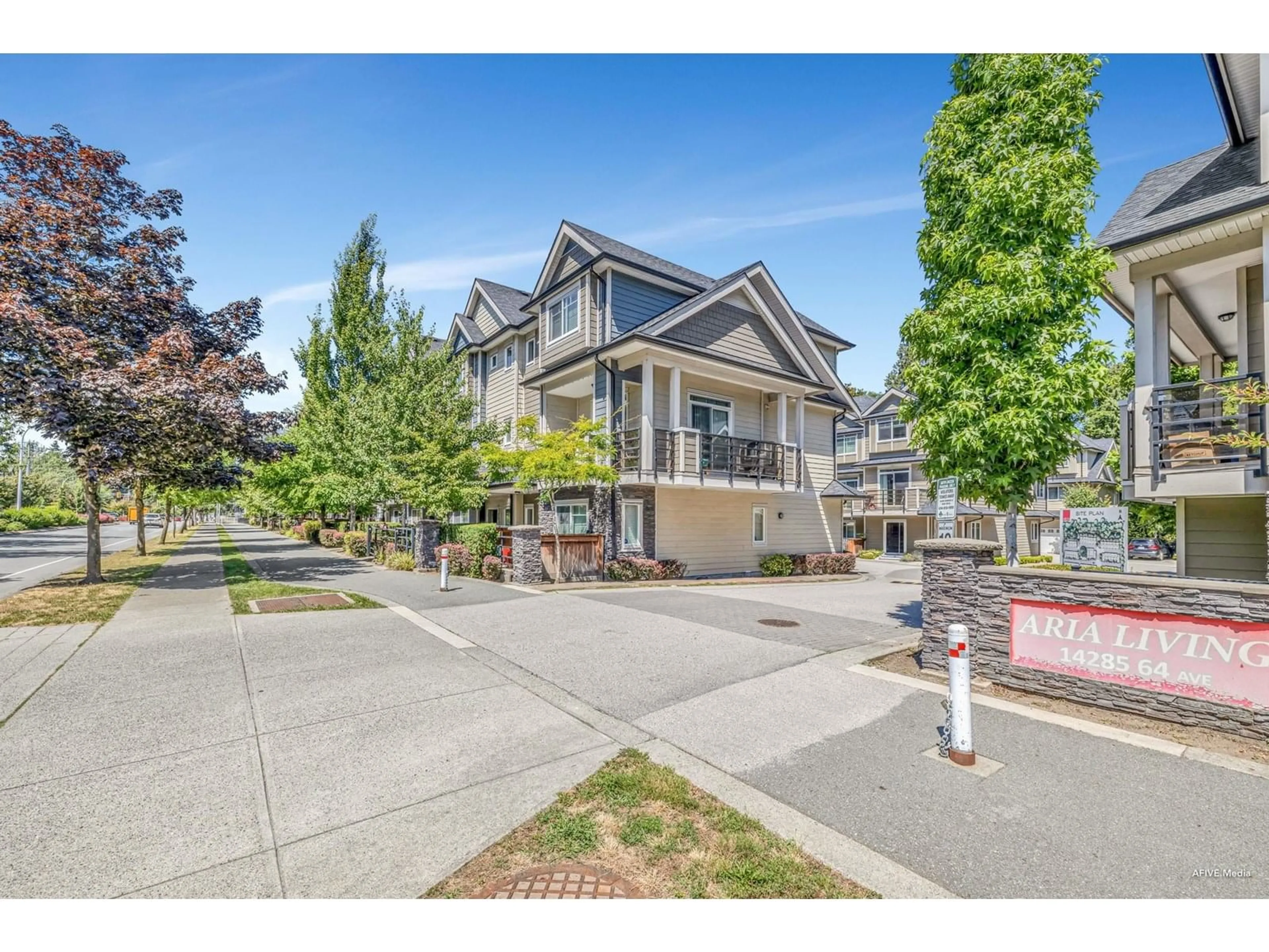 A pic from outside/outdoor area/front of a property/back of a property/a pic from drone, street for 9 - 14285 64, Surrey British Columbia V3W1Z2