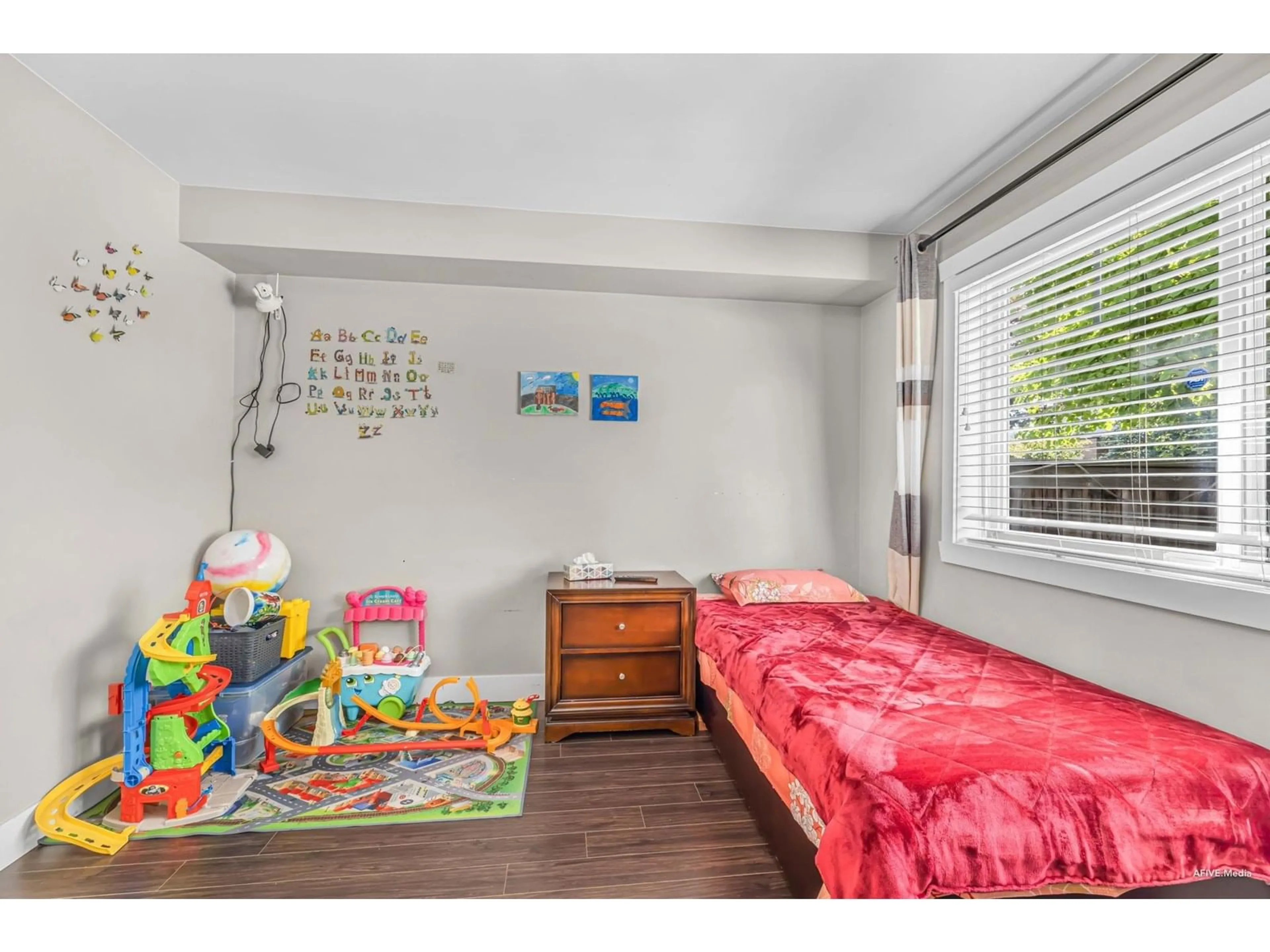 Bedroom with bed, wood/laminate floor for 9 - 14285 64, Surrey British Columbia V3W1Z2