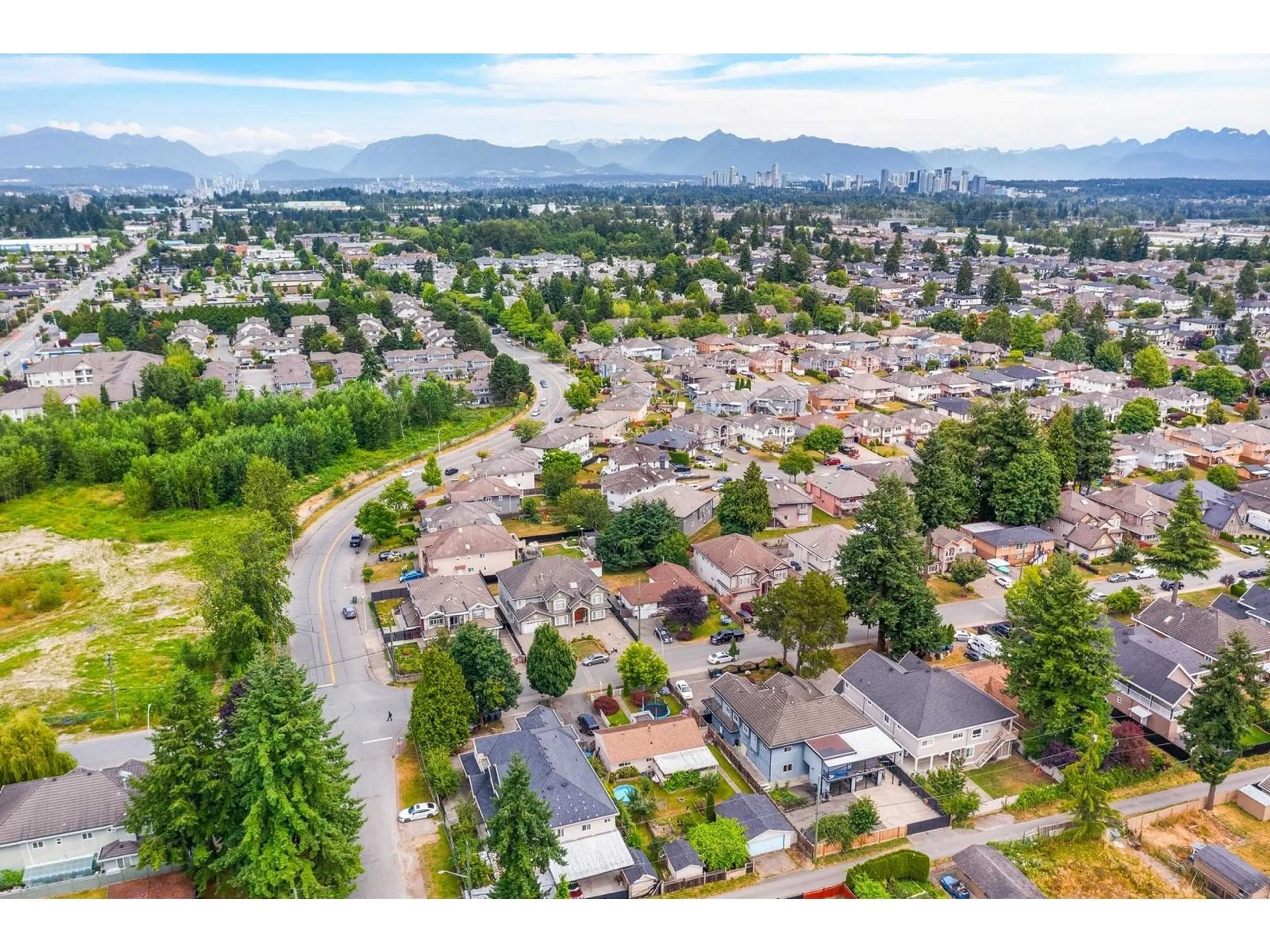 A pic from outside/outdoor area/front of a property/back of a property/a pic from drone, mountain view for 12070 76A, Surrey British Columbia V3W2W5