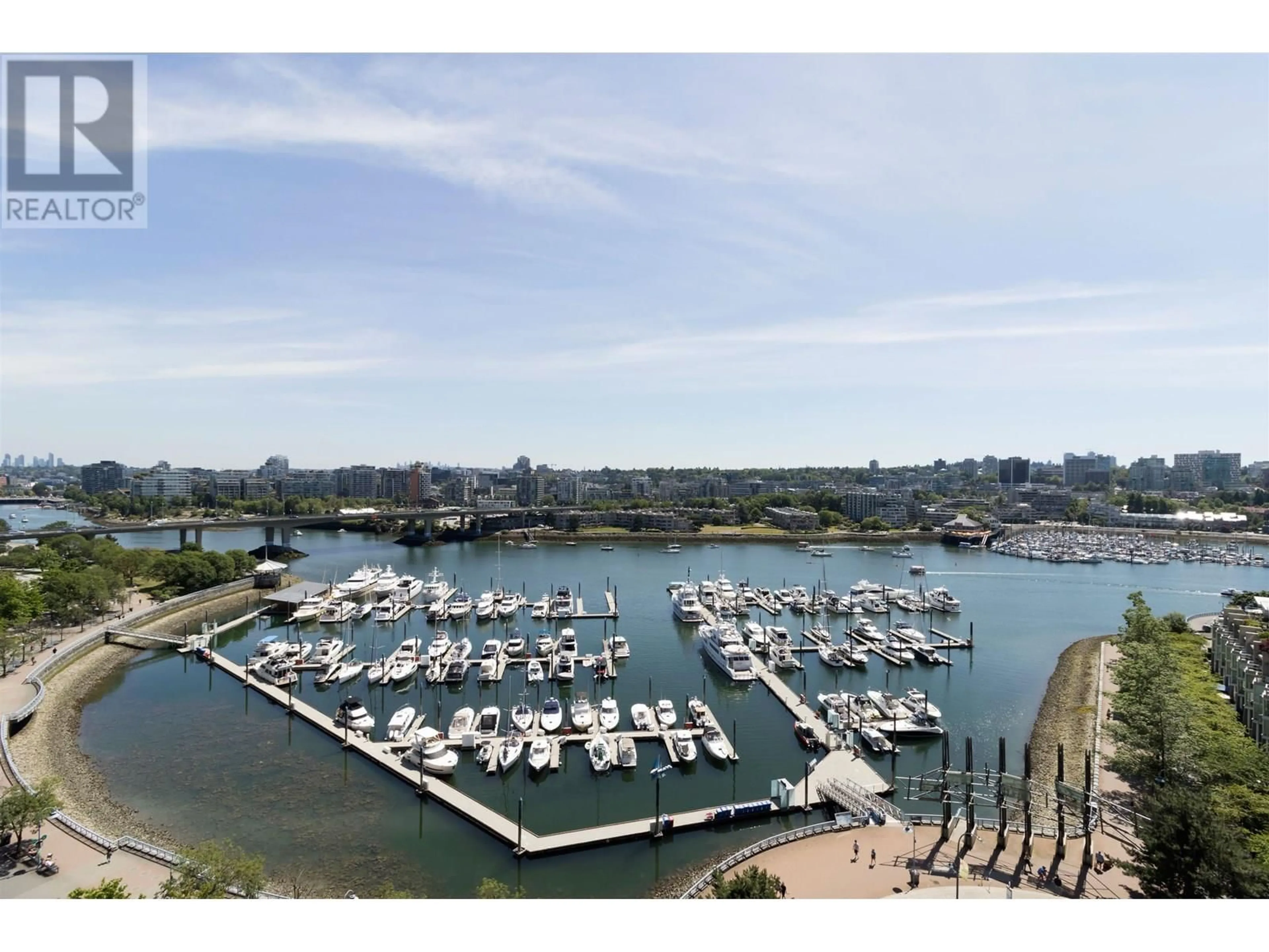 A pic from outside/outdoor area/front of a property/back of a property/a pic from drone, water/lake/river/ocean view for 1702 - 1199 MARINASIDE CRESCENT, Vancouver British Columbia V6Z2Y2