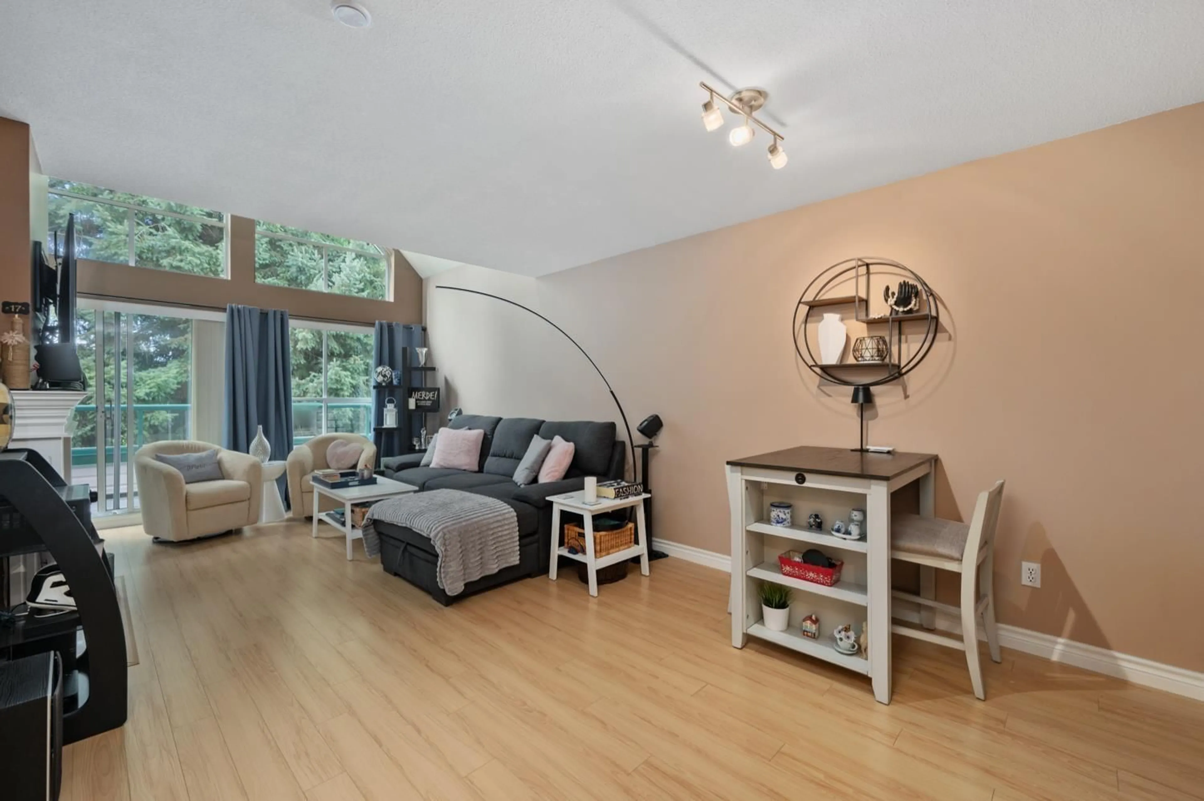 Living room with furniture, wood/laminate floor for 407 - 33280 BOURQUIN EAST, Abbotsford British Columbia V2S7K2