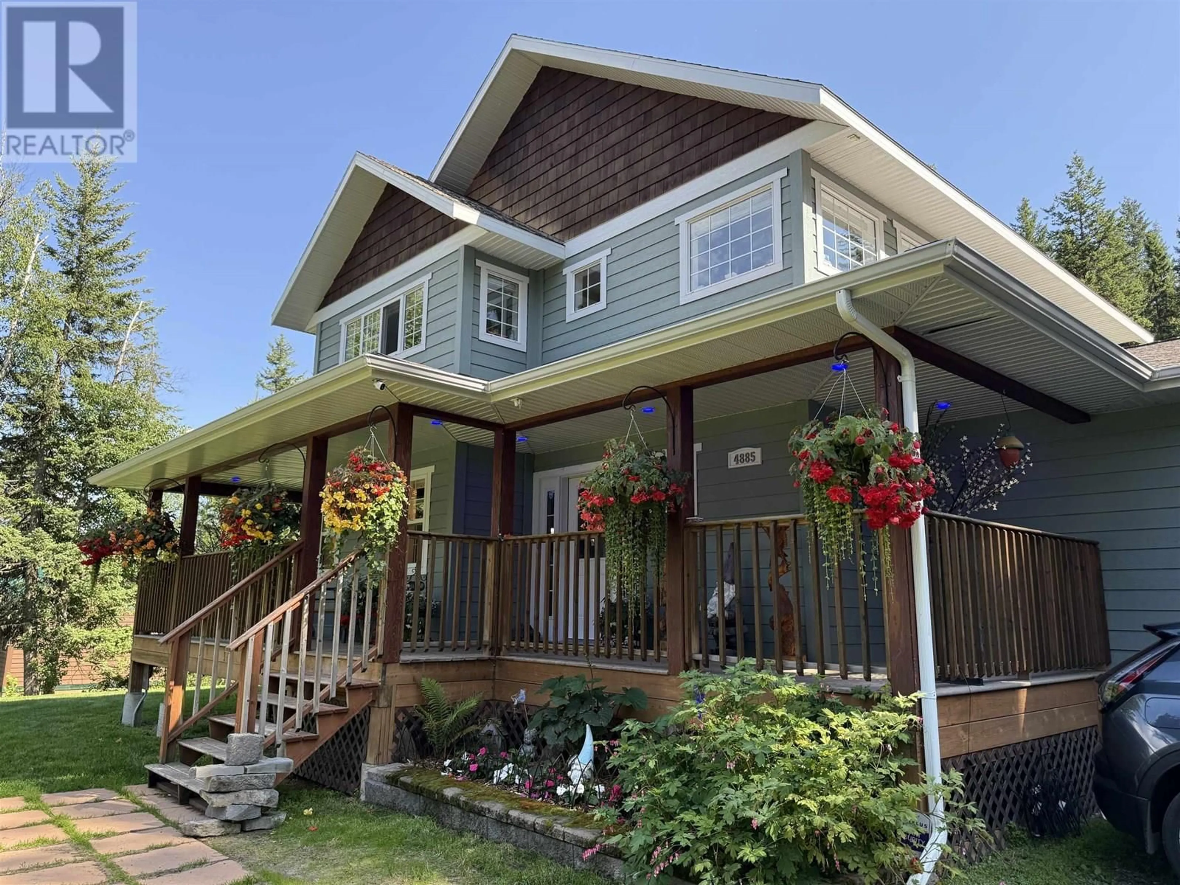 Home with vinyl exterior material, street for 4885 CREST ROAD, Prince George British Columbia V2M7C5