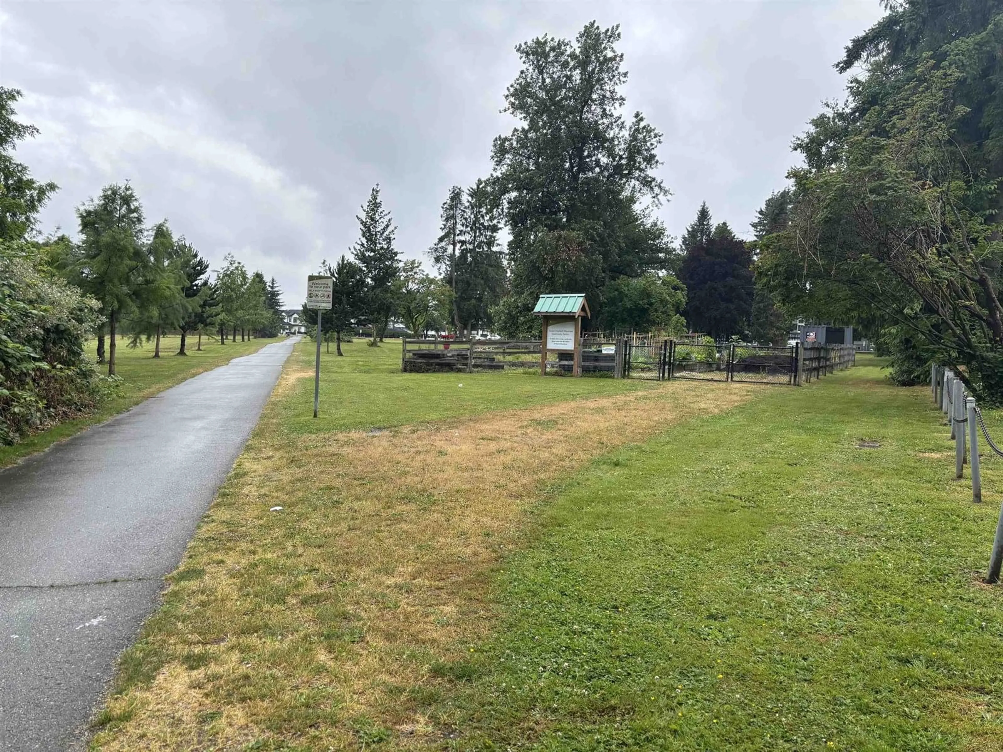 A pic from outside/outdoor area/front of a property/back of a property/a pic from drone, unknown for 102 - 13458 95, Surrey British Columbia V3P1P5