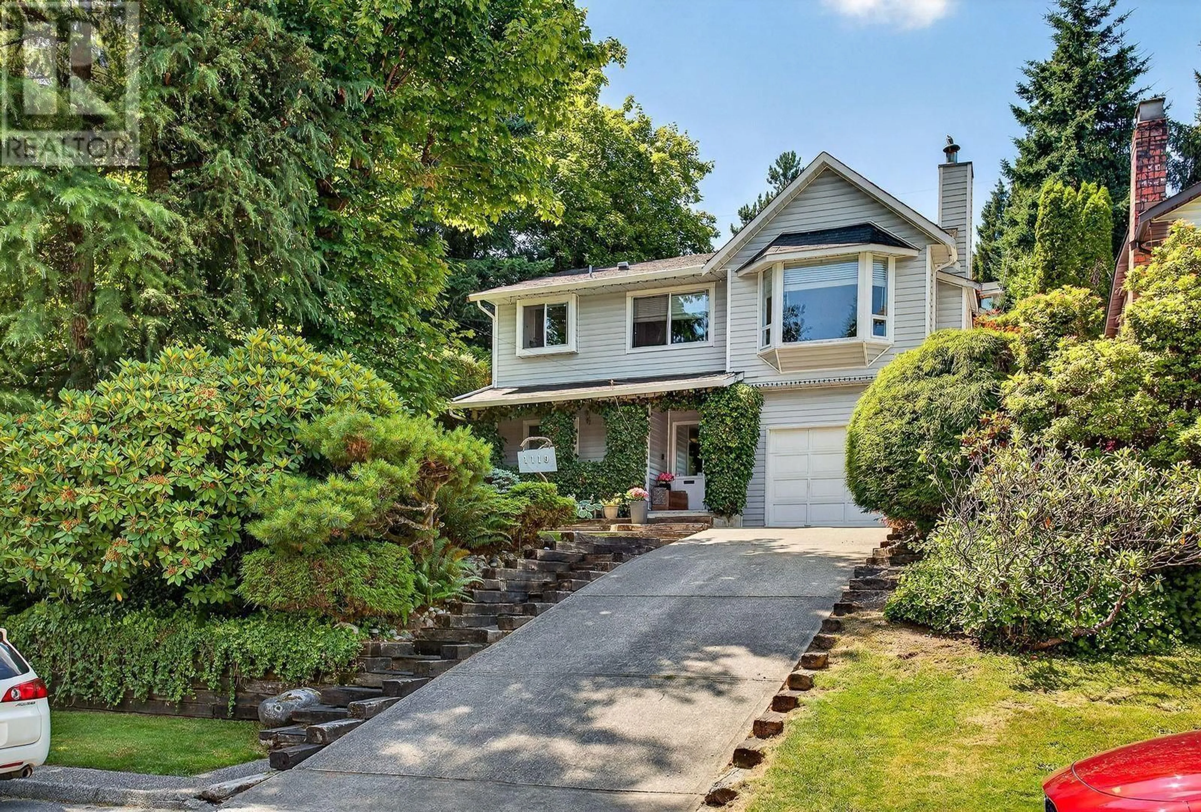 Home with vinyl exterior material, street for 1119 CECILE DRIVE, Port Moody British Columbia V3H1M8