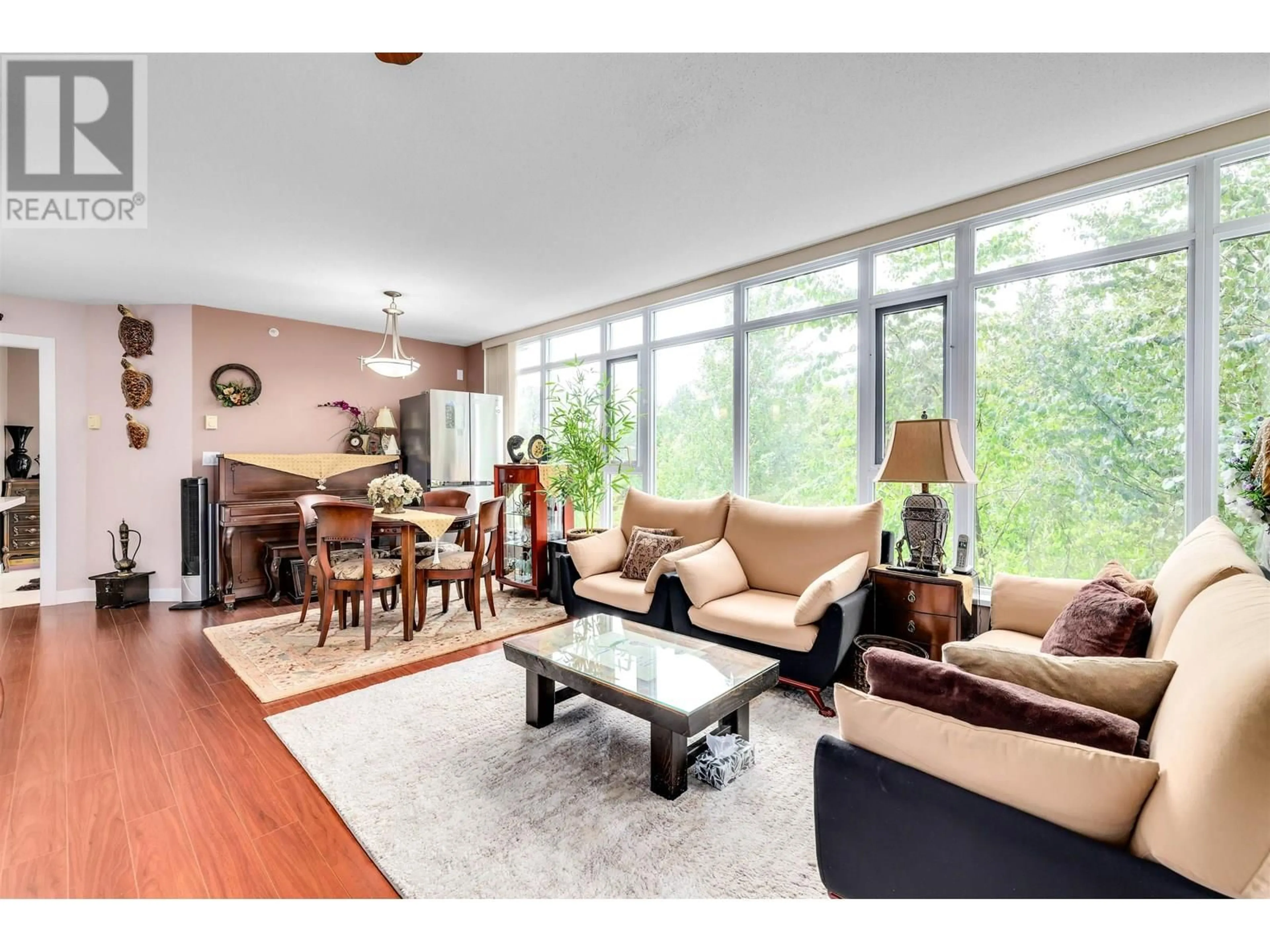 Living room with furniture, wood/laminate floor for 303 - 7090 EDMONDS STREET, Burnaby British Columbia V3N0C6