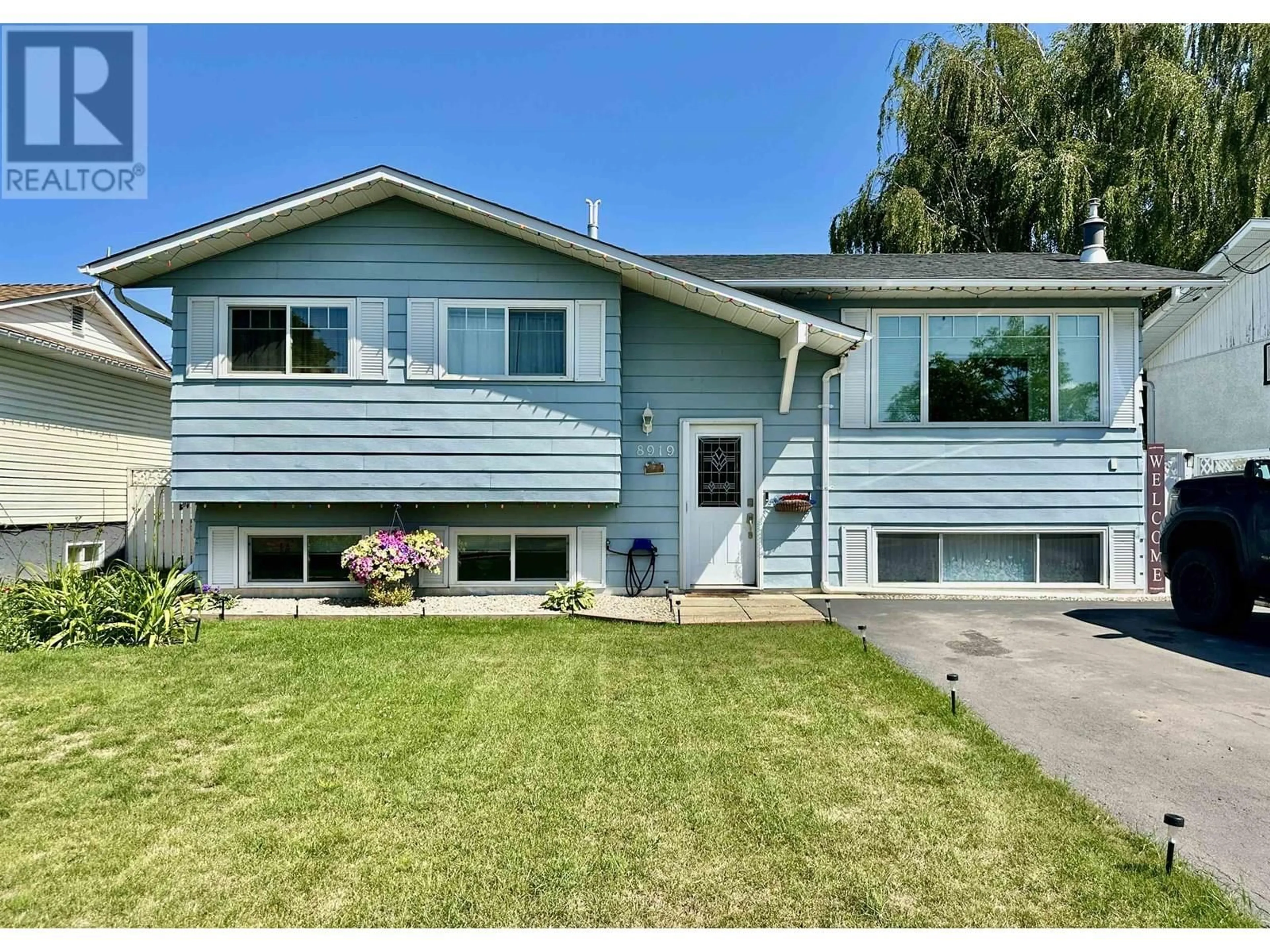 Home with vinyl exterior material, street for 8919 90 STREET, Fort St. John British Columbia V1J4Z1