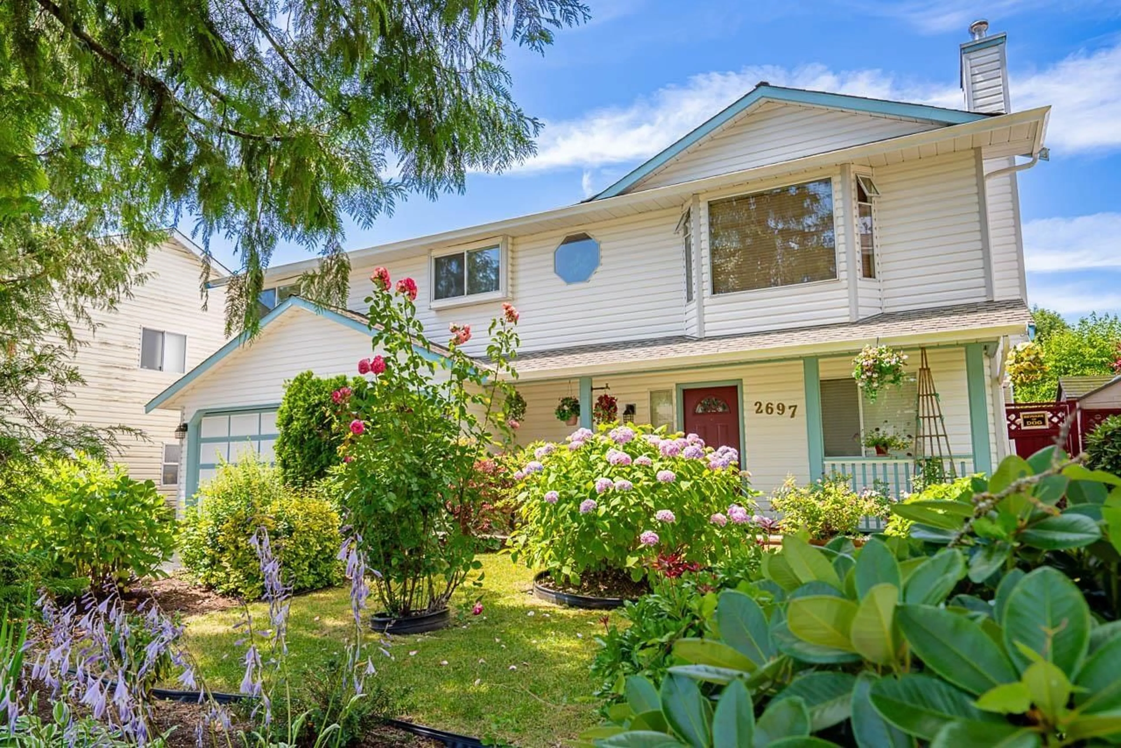 Home with vinyl exterior material, street for 2697 273A, Langley British Columbia V4W3K3