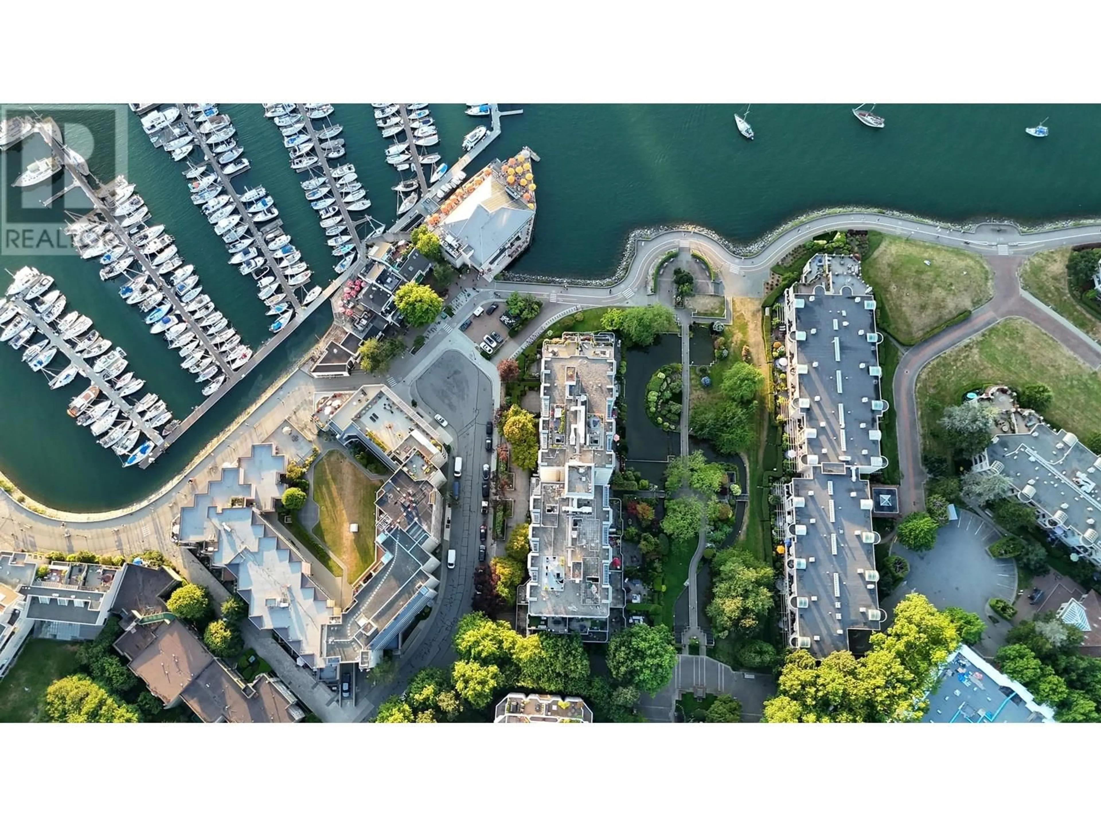 A pic from outside/outdoor area/front of a property/back of a property/a pic from drone, water/lake/river/ocean view for 411 - 456 MOBERLY ROAD, Vancouver British Columbia V5Z4L7